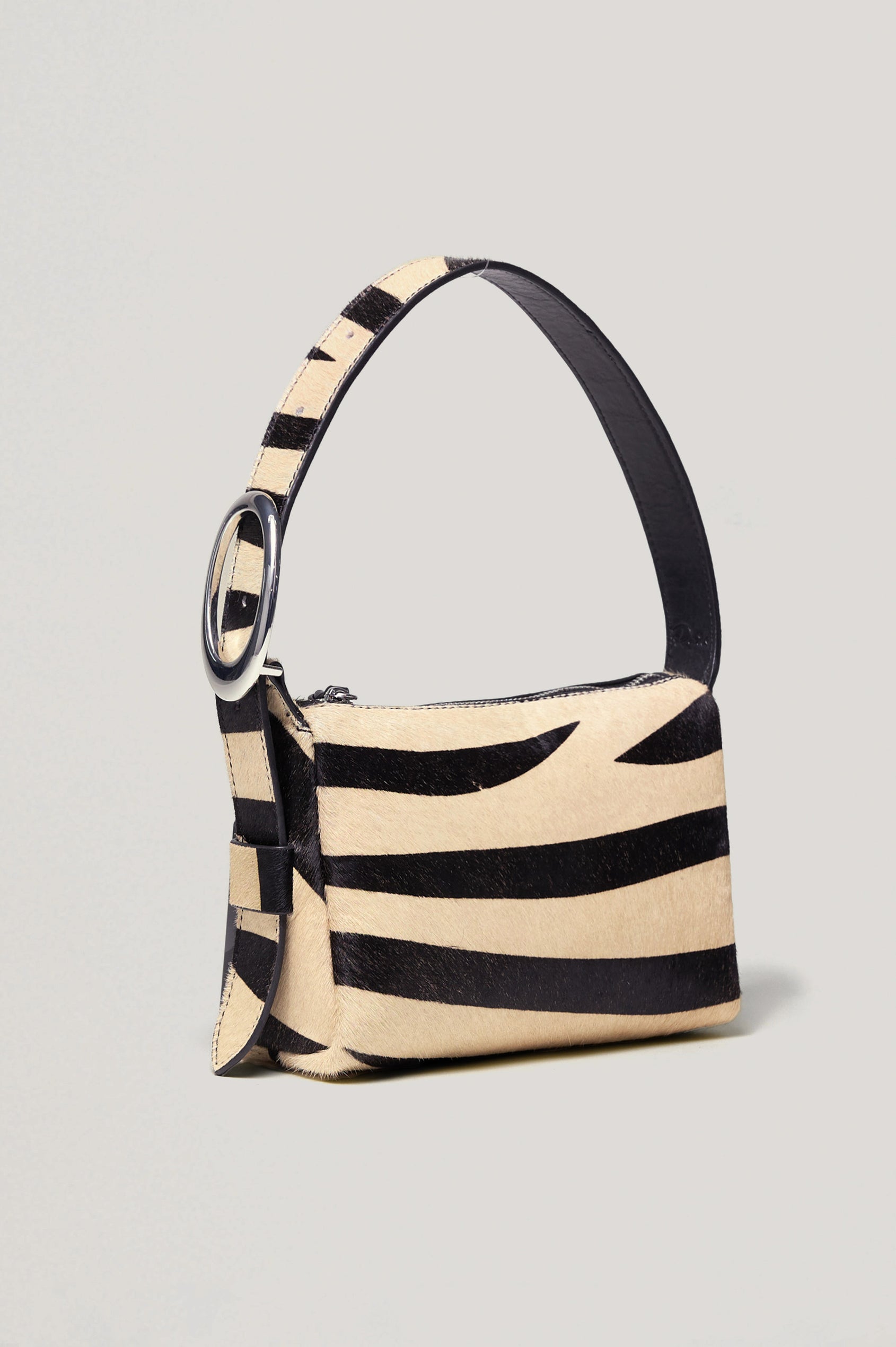 Lucca Shoulder Bag in Calfhair With Adjustable Strap and Polished Silver Buckle, Microsuede Lining, and Snap Button Interior Slip Pocket in Zebra Haircalf Colorway - Side View Featured