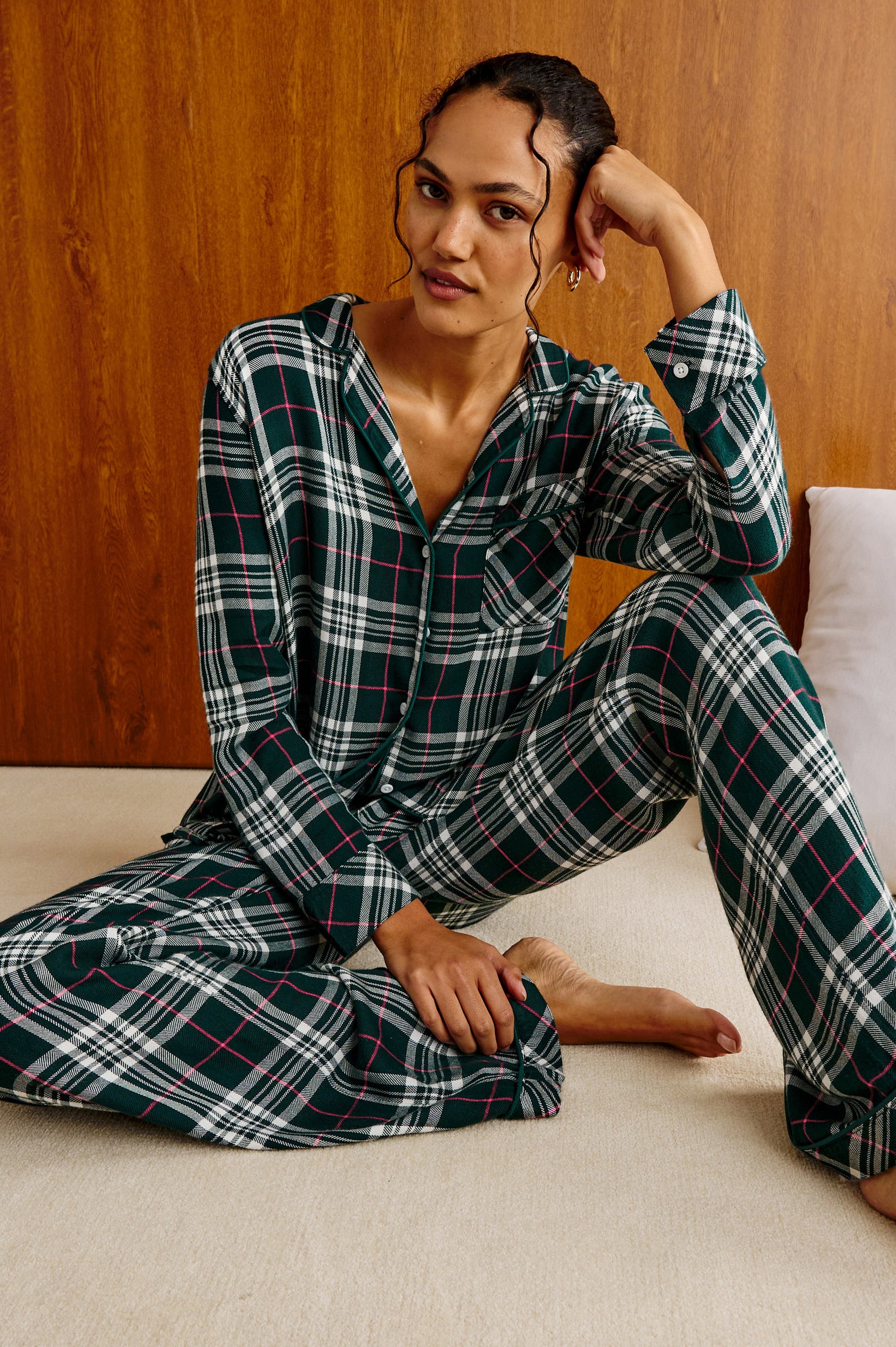 Luna Pajama Set in Signature Rayon With Button-Up Shirt, Matching Pants, and Relaxed Fit in Evergreen Fuschia Colorway - Full Body View Featured on Model Sitting