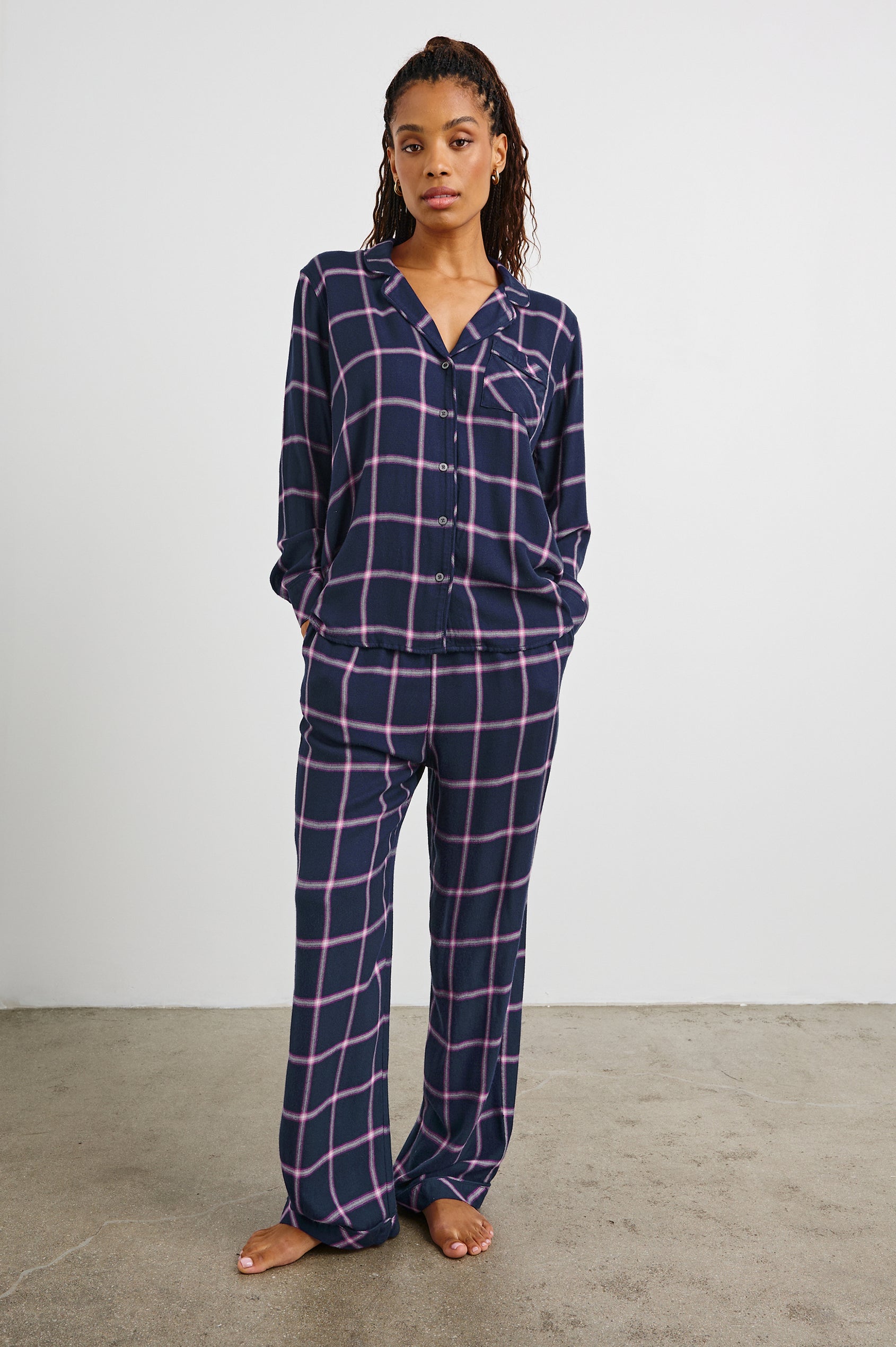 Luna Pajama Set with a Long Sleeve, Button Up, V Neck Top with a Chest Patch Pocket and Pants with Two Front Pockets in Sapphire Magenta Colorway, a plaid - Front Full Body View Featured on Model  