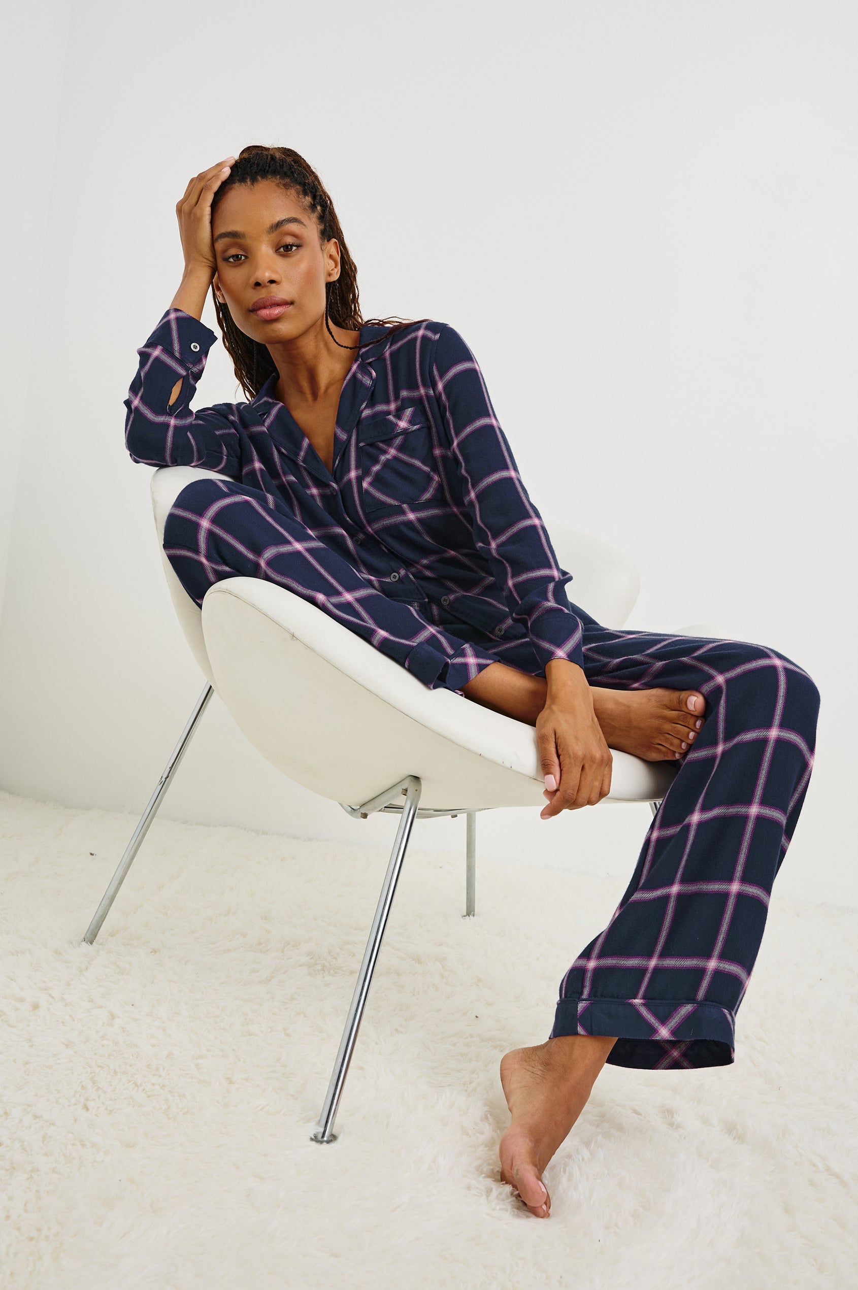 Luna Pajama Set with a Long Sleeve, Button Up, V Neck Top with a Chest Patch Pocket and Pants with Two Front Pockets in Sapphire Magenta Colorway, a plaid - Front Full Body View Featured on Seated Model  