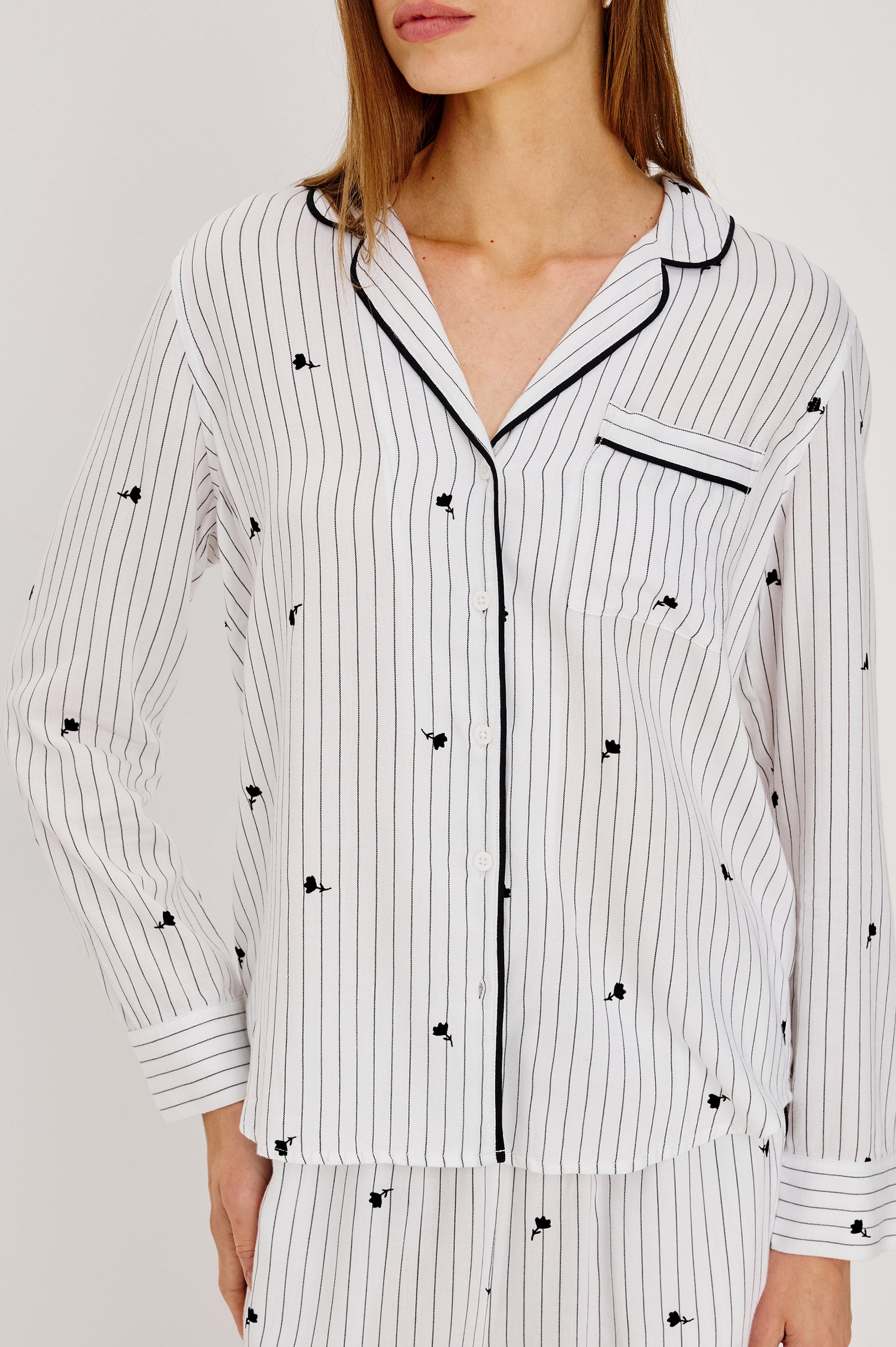 Luna Pajama Set in Signature Rayon With Button-Up Shirt, Matching Pants, and Relaxed Fit in Striped Onyx Floral Colorway - Upper Body Front View Featured on Model