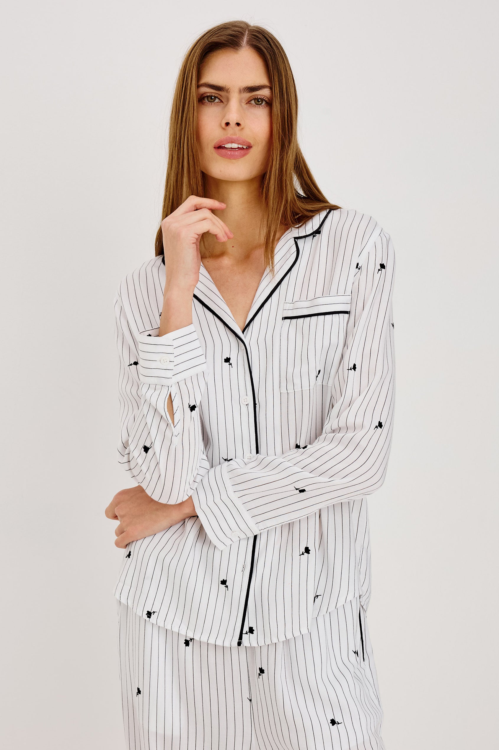 Luna Pajama Set in Signature Rayon With Button-Up Shirt, Matching Pants, and Relaxed Fit in Striped Onyx Floral Colorway - Upper Body Front View Featured on Model