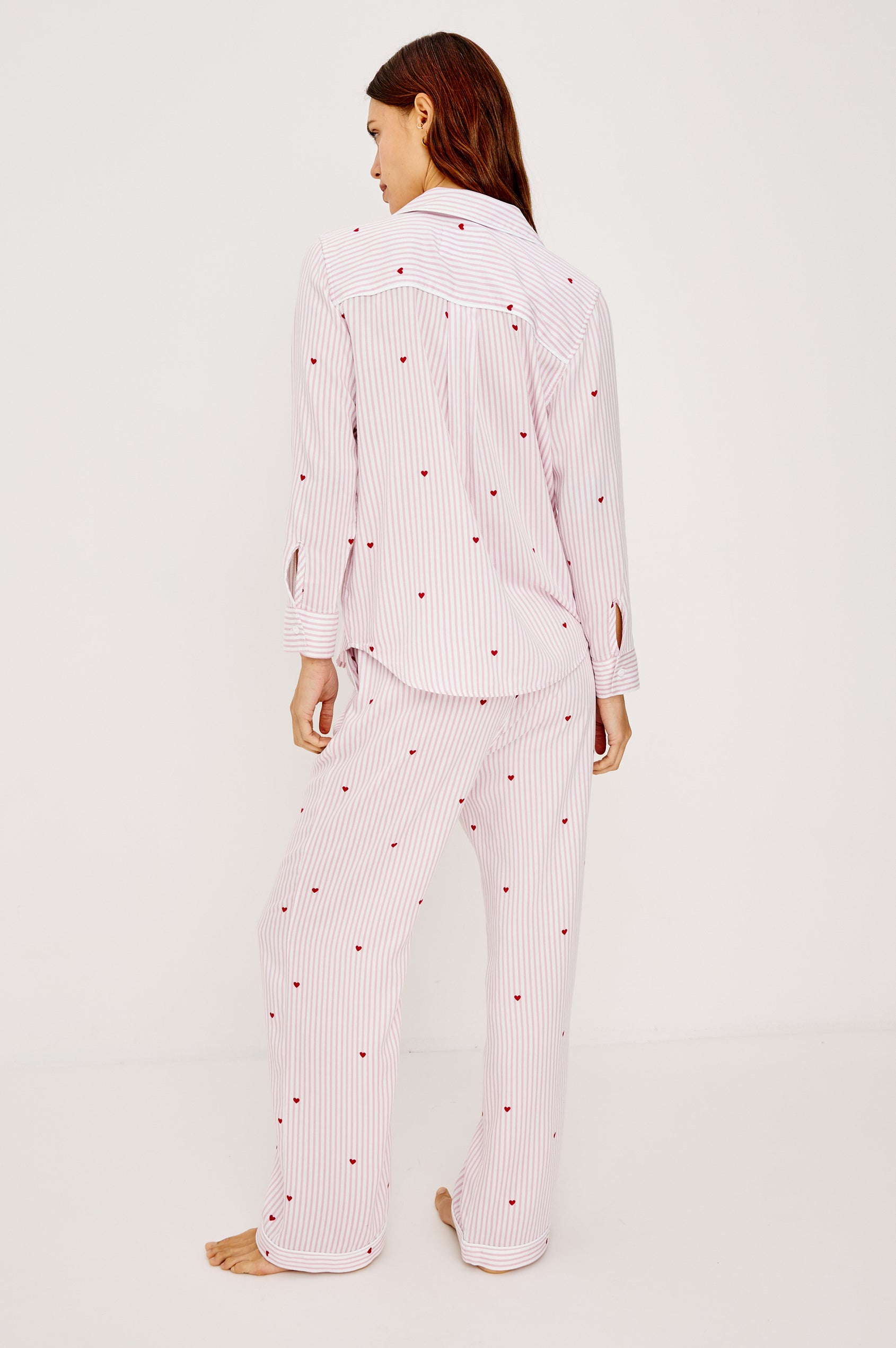 Luna Pajama Set in Signature Rayon With Button-Up Collared Shirt With Front Buttons, Long Sleeves, Chest Patch Pocket and Matching Shorts With Side Pockets and Drawstring Waist Ties in Rose Stripe Hearts Colorway - Full Body Back View Featured on Model