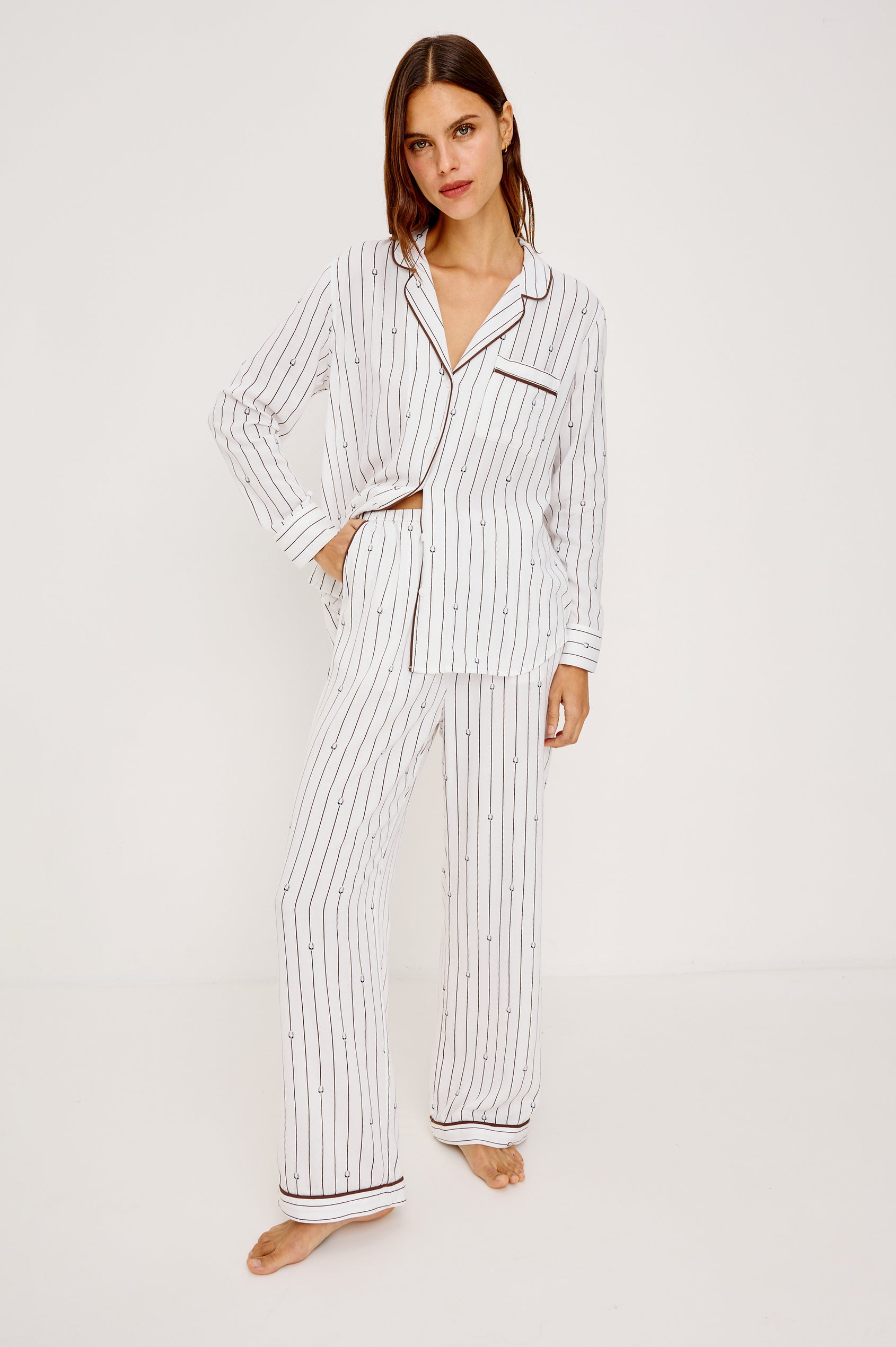 Luna Pajama Set in Signature Rayon With Button-Up Collared Shirt With Front Buttons, Long Sleeves, Chest Patch Pocket and Matching Shorts With Side Pockets and Drawstring Waist Ties in Striped Lucky Horseshoes Colorway - Full Body Front View Featured on Model