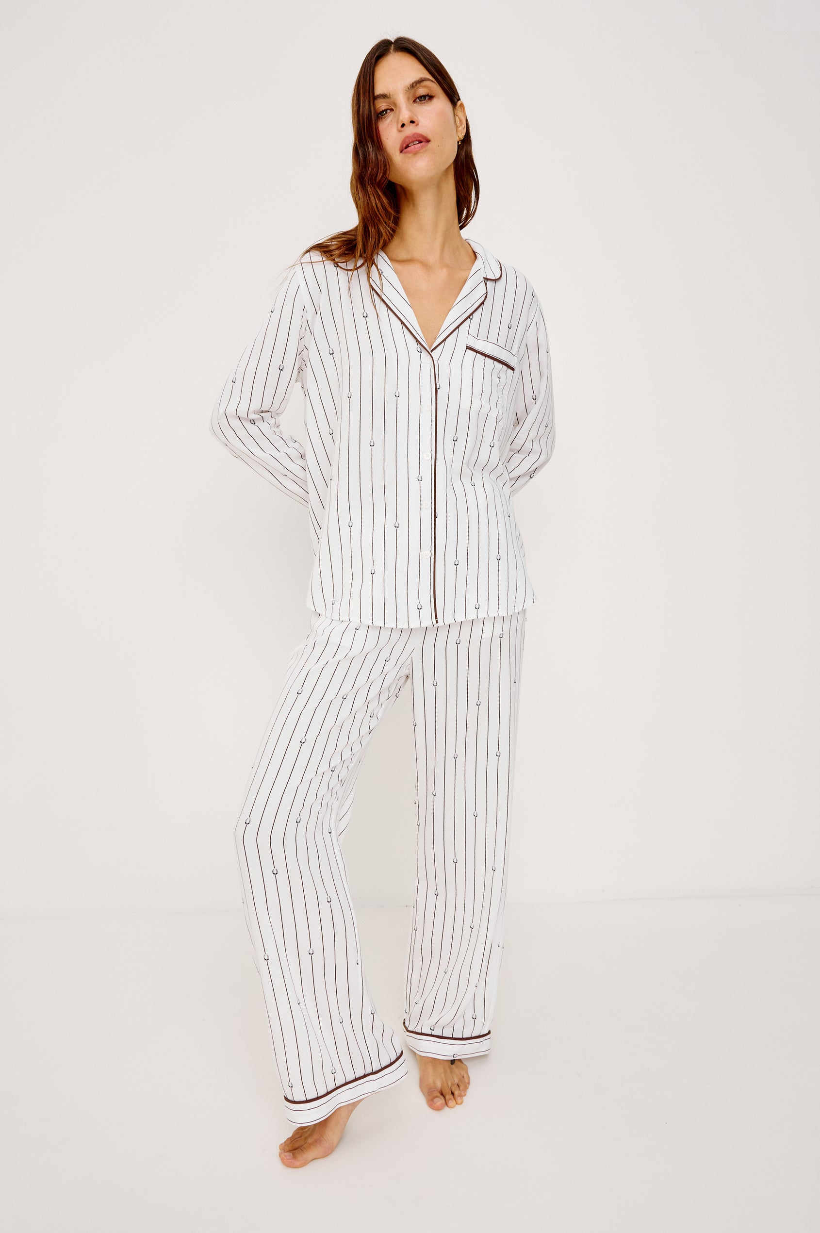 Luna Pajama Set in Signature Rayon With Button-Up Collared Shirt With Front Buttons, Long Sleeves, Chest Patch Pocket and Matching Pants With Side Pockets and Drawstring Waist Ties in Striped Lucky Horseshoes Colorway - Full Body Front View Featured on Model