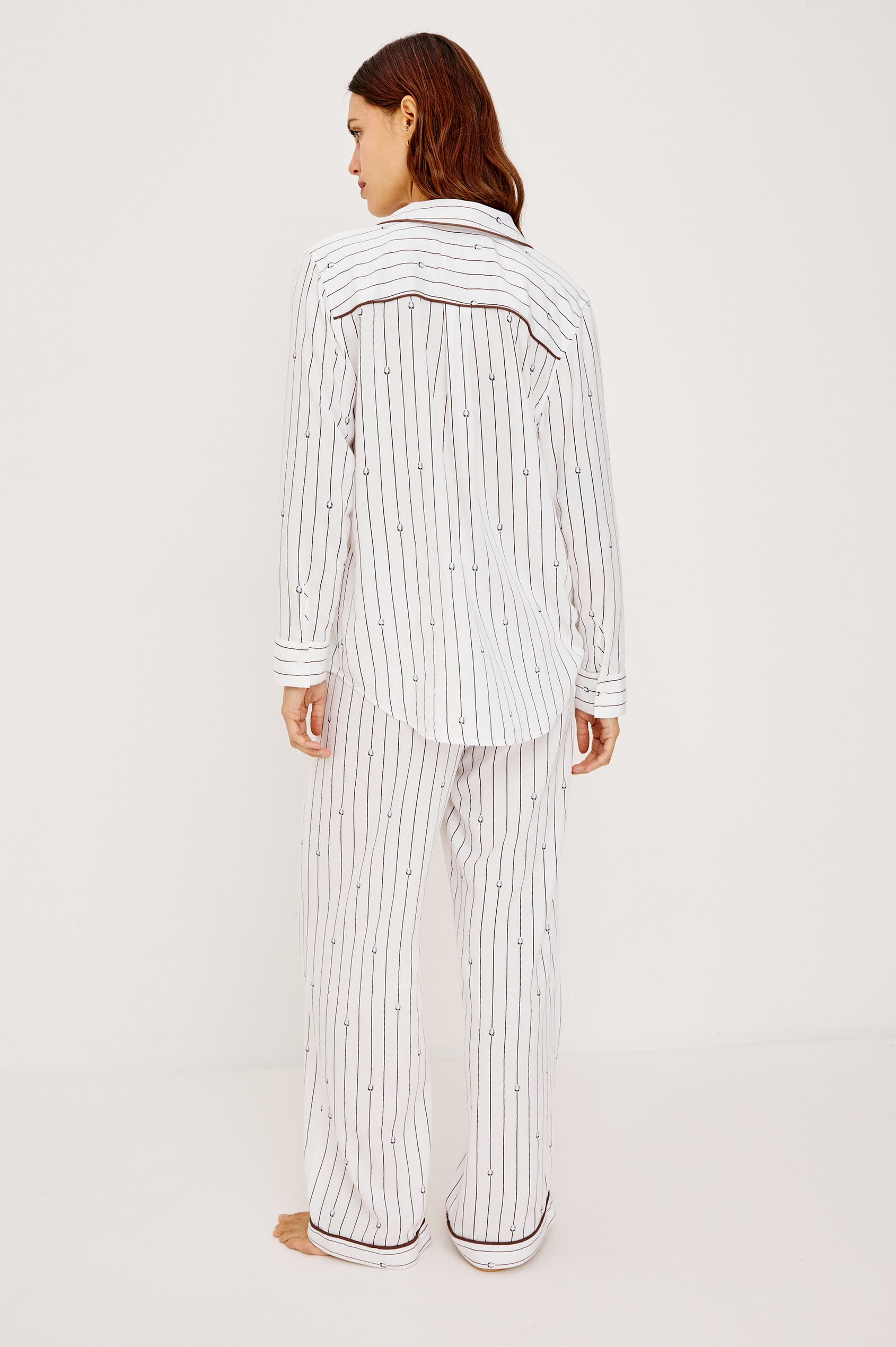 Luna Pajama Set in Signature Rayon With Button-Up Collared Shirt With Front Buttons, Long Sleeves, Chest Patch Pocket and Matching Pants With Side Pockets and Drawstring Waist Ties in Striped Lucky Horseshoes Colorway - Full Body Back View Featured on Model