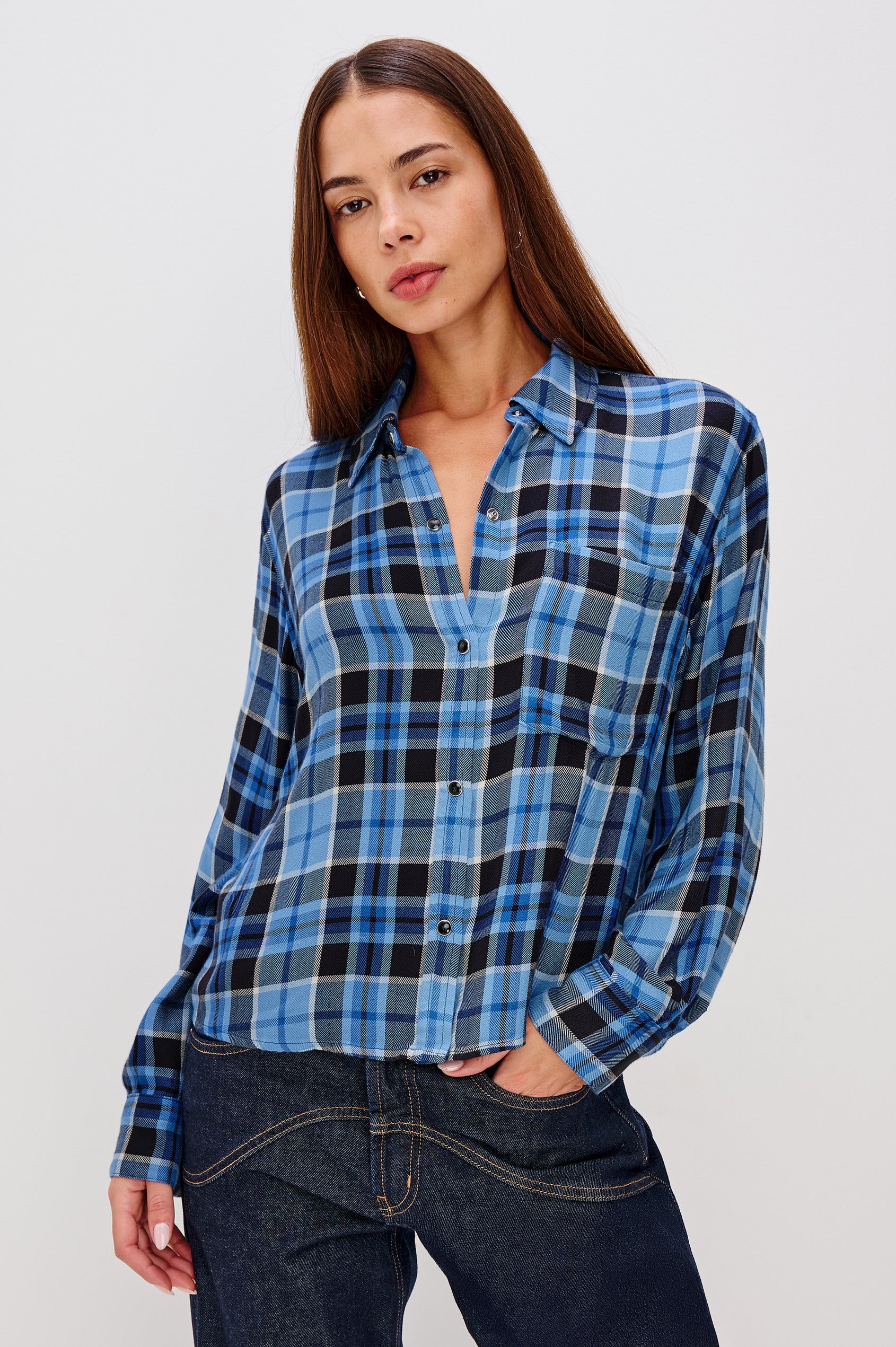 Malin Cropped Long-Sleeve Button Up with a Chest Patch Pocket in Midnight Blue White Colorway, plaid - Front View Featured on Model