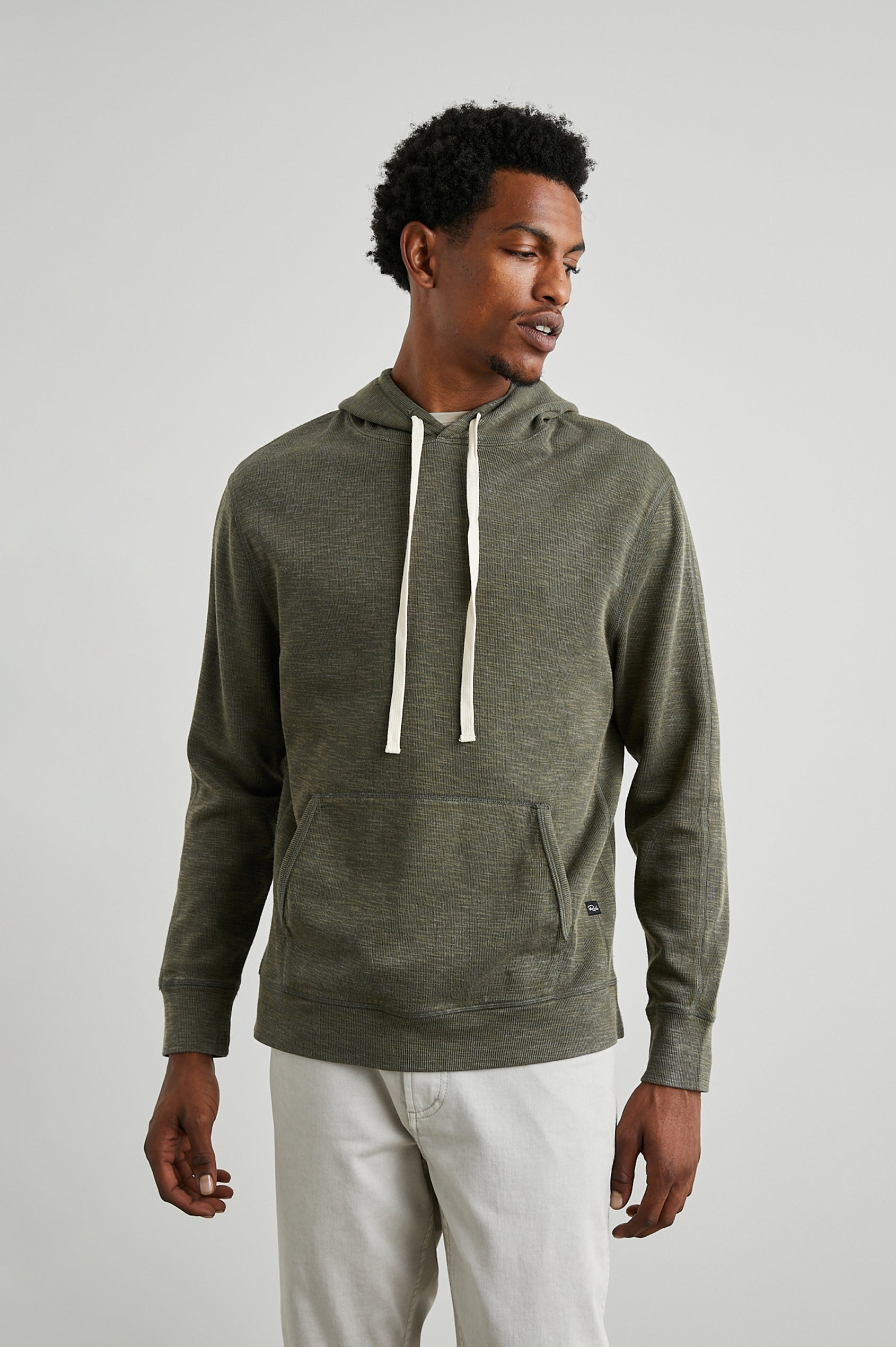 Mammoth Long-Sleeve Hoodie with a Kangaroo Pocket and Drawstring Hood in Surplus Colorway - Front View Featured on Model