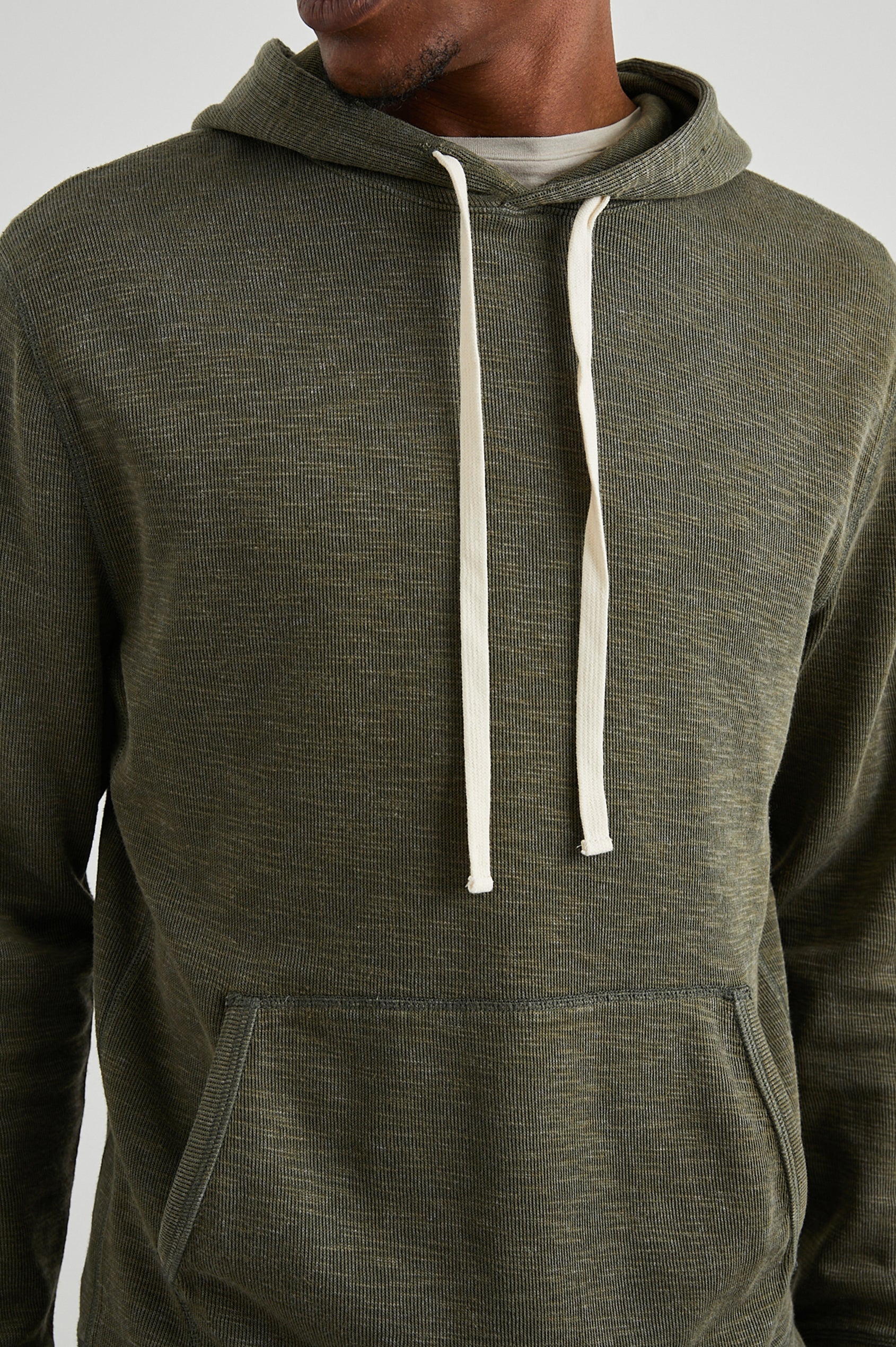 Mammoth Long-Sleeve Hoodie with a Kangaroo Pocket and Drawstring Hood in Surplus Colorway - Front View Featured on Model