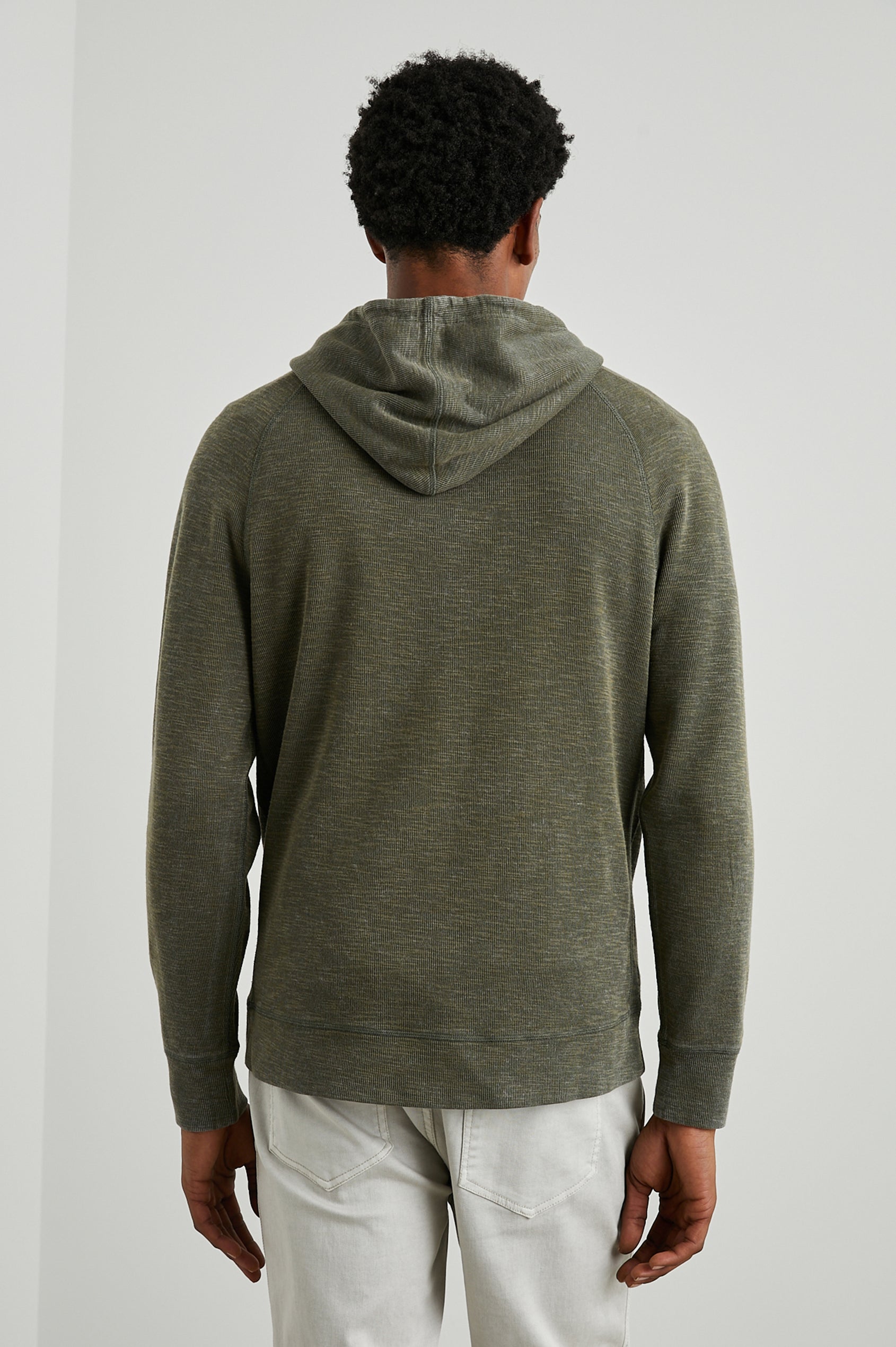 Mammoth Long-Sleeve Hoodie with a Kangaroo Pocket and Drawstring Hood in Surplus Colorway - Back View Featured on Model