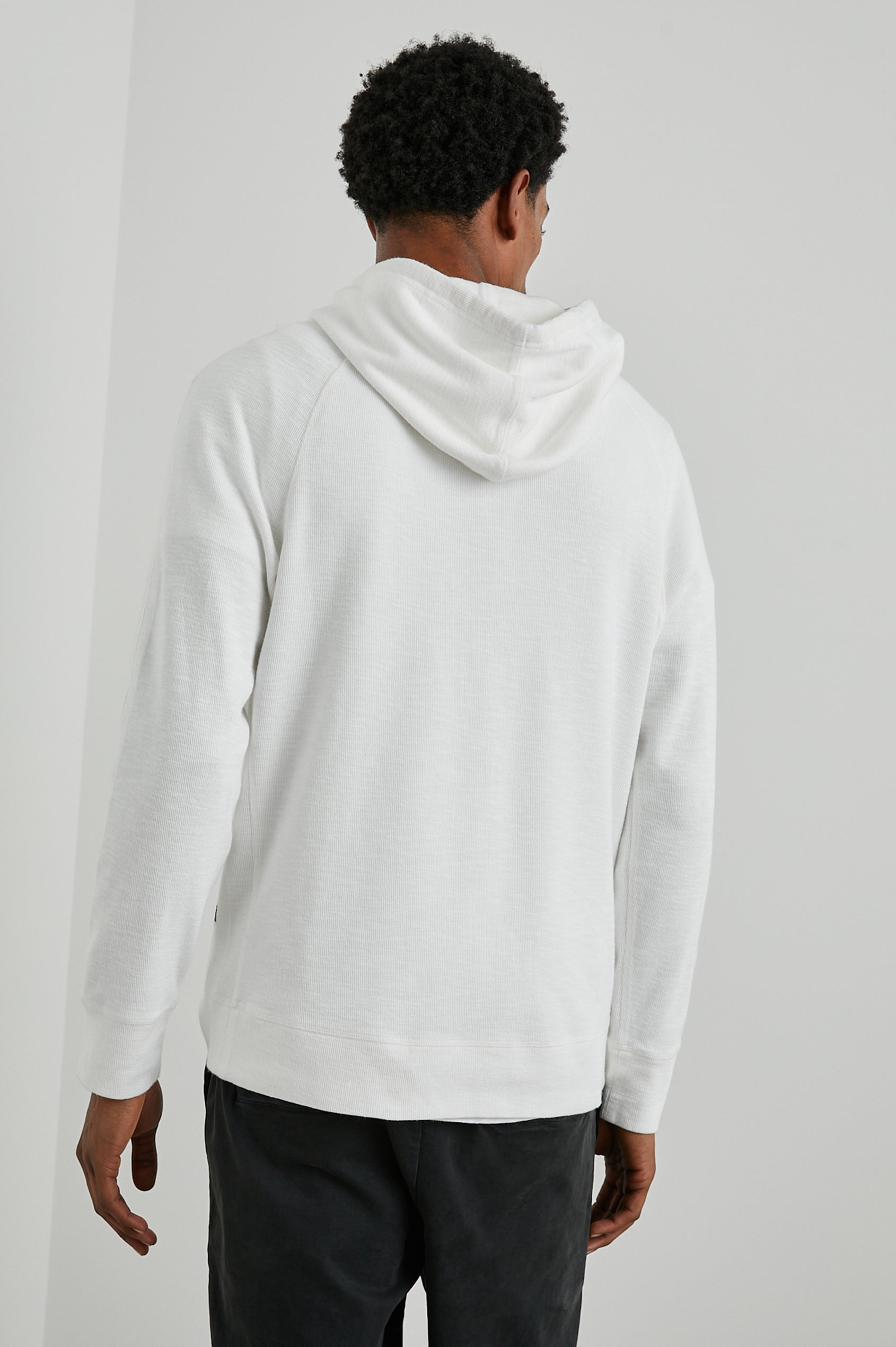 Mammoth Long-Sleeve Hoodie with a Kangaroo Pocket and Drawstring Hood in Whitecap Colorway - Back View Featured on Model