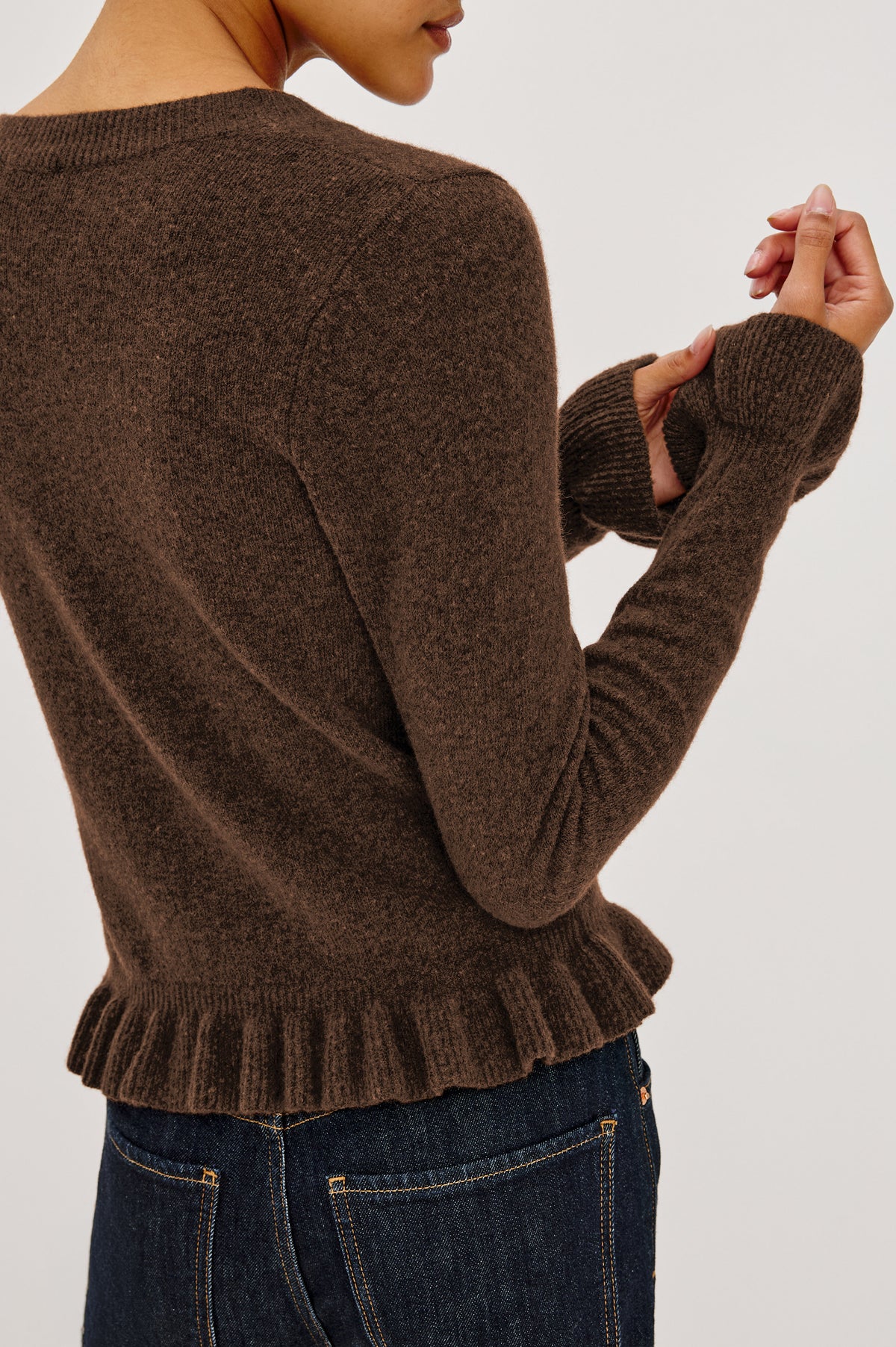 Mandy Sweater in Cashmere-Cotton-Wool Blend Knit Front Buttons, Long Sleeves, Classic Slightly Cropped Fit, and Ribbed Ruffle Trim in Heather Latte Colorway - Front Crop Detail View Featured on Model.