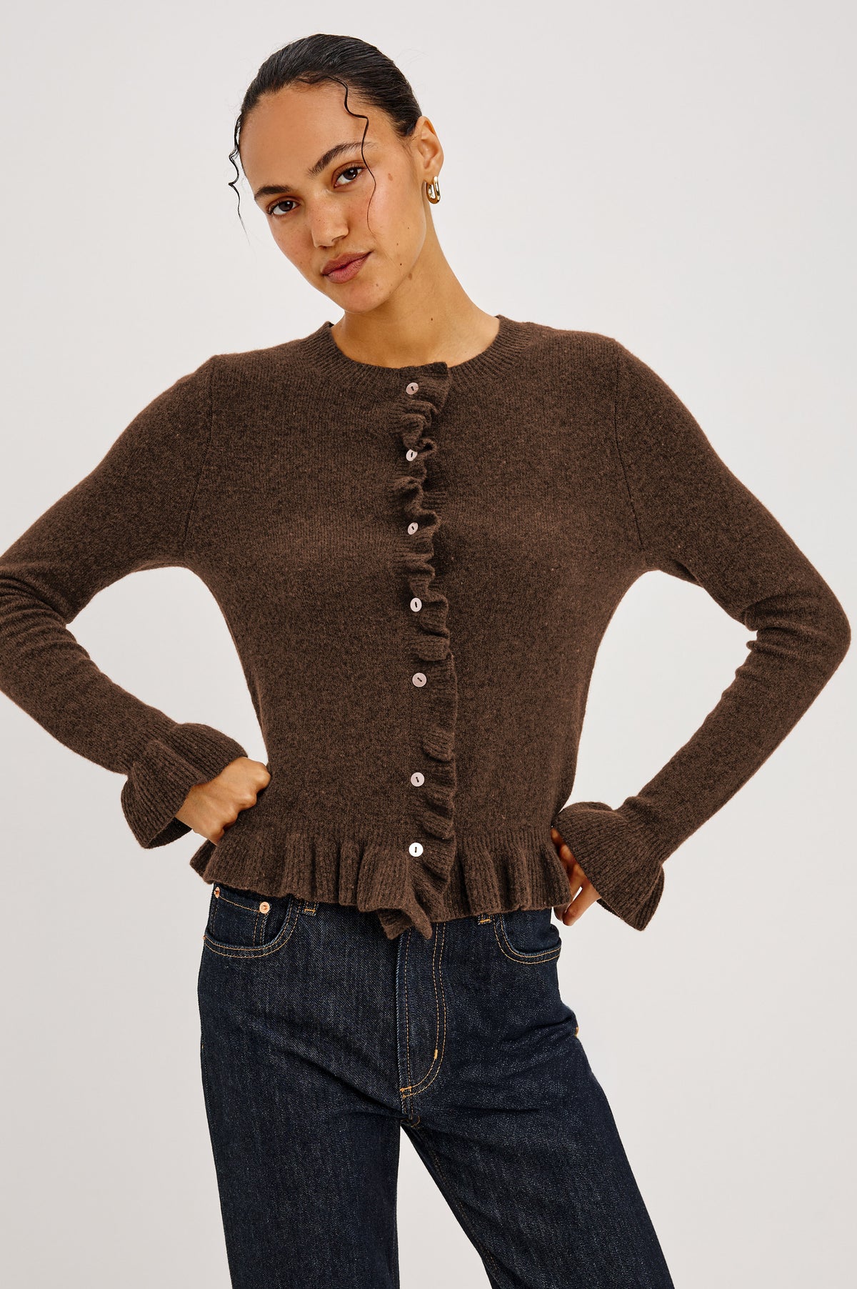 Mandy Sweater in Cashmere-Cotton-Wool Blend Knit Front Buttons, Long Sleeves, Classic Slightly Cropped Fit, and Ribbed Ruffle Trim in Heather Latte Colorway - Front Crop View Featured on Model.