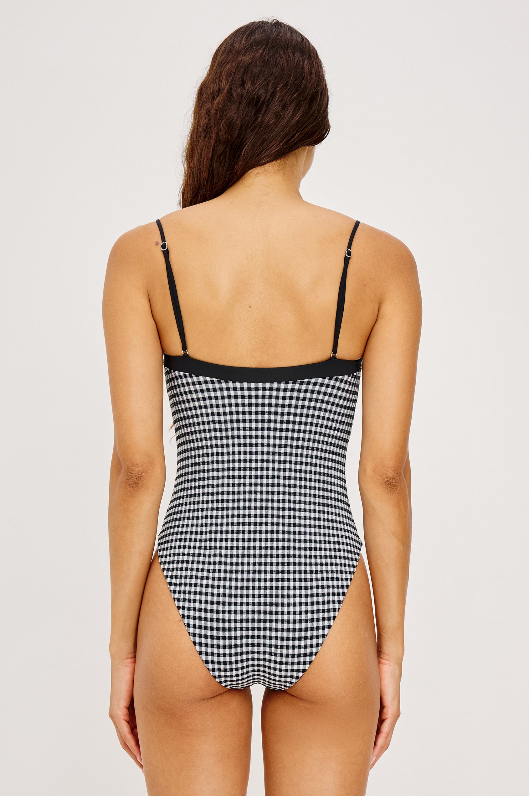 Marbella One Piece Swimsuit With Straight Neckline, Adjustable Shoulder Straps, and Classic Rear Coverage in Black White Gingham Colorway - Upper Body Back View Featured on Model