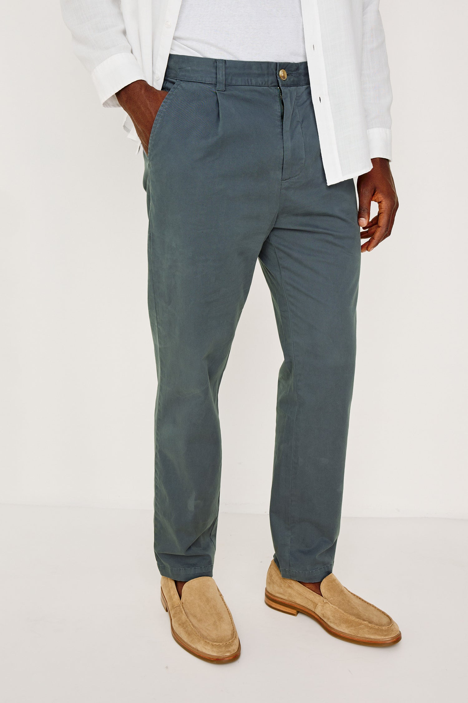 Marcellus Pants with Belt Loops, Two Seam Front Pockets, a Front Buttoned Flap Pocket, a Back Buttoned Welt Pocket and a Back Welt Pocket in Faded Blue Colorway - Front View Featured on Model