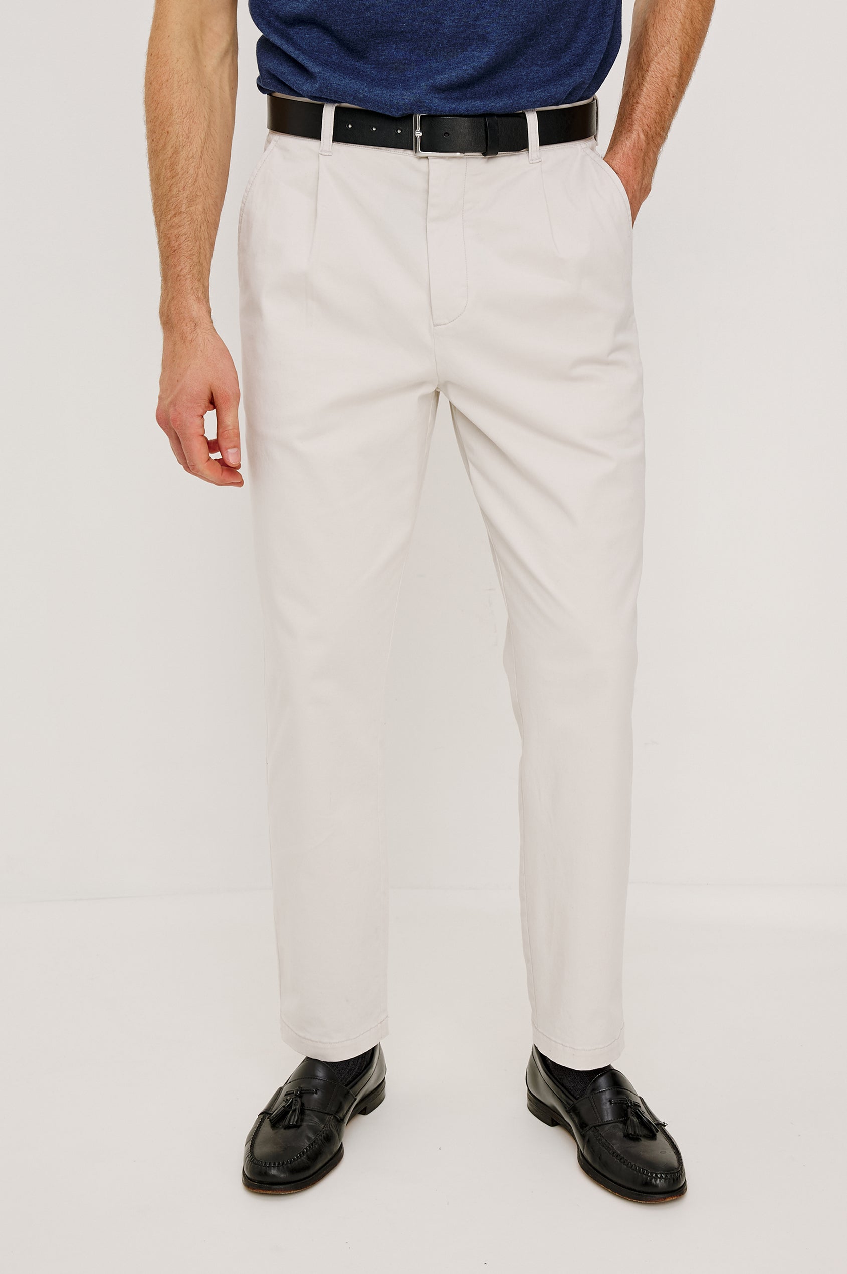 Marcellus Pants with Belt Loops, Two Seam Front Pockets, a Front Buttoned Flap Pocket, a Back Buttoned Welt Pocket and a Back Welt Pocket in Faded Blue Colorway - Lower Body Front View Featured on Model