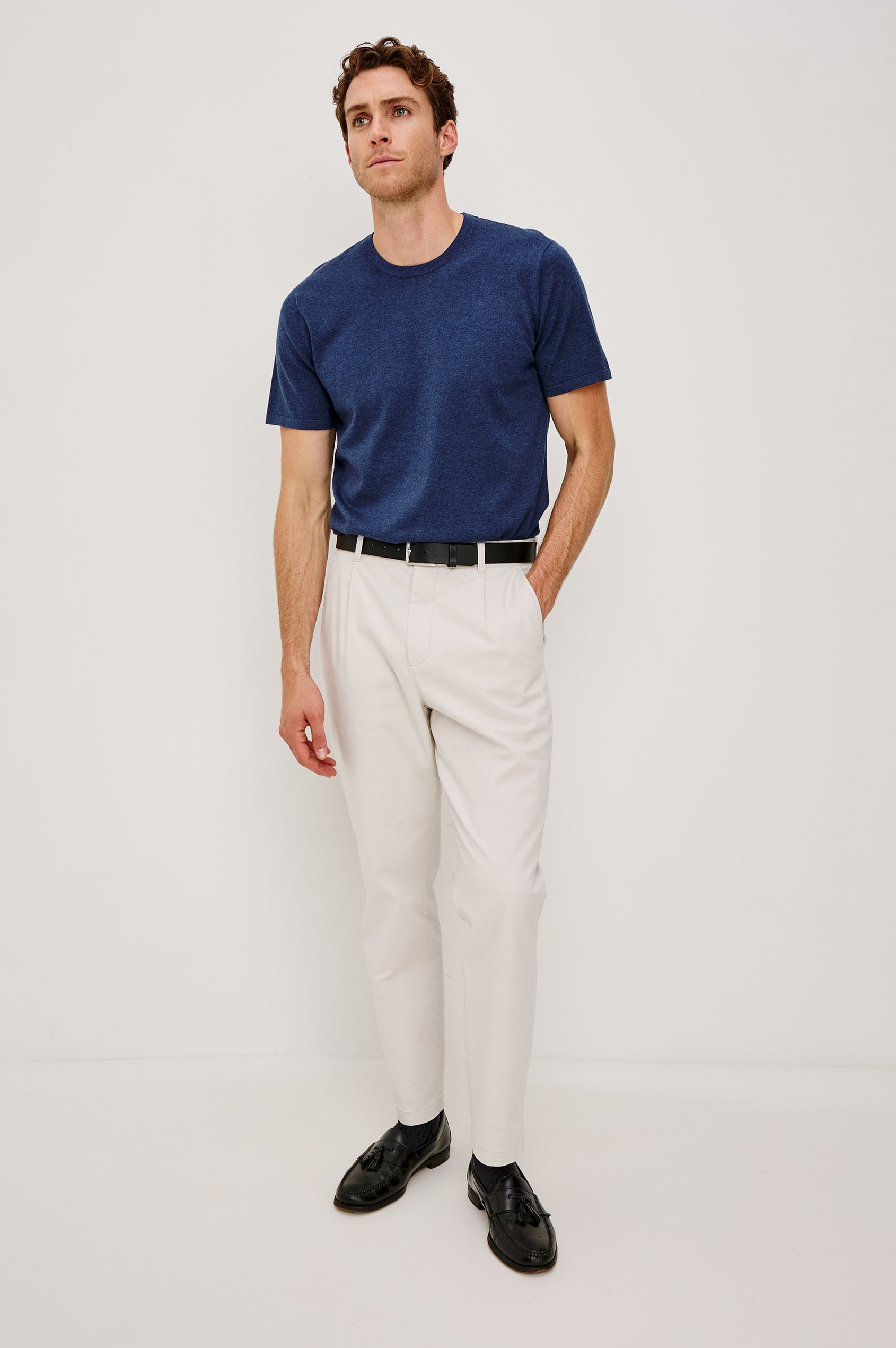 Marcellus Pants with Belt Loops, Two Seam Front Pockets, a Front Buttoned Flap Pocket, a Back Buttoned Welt Pocket and a Back Welt Pocket in Faded Blue Colorway - Full Body Front View Featured on Model