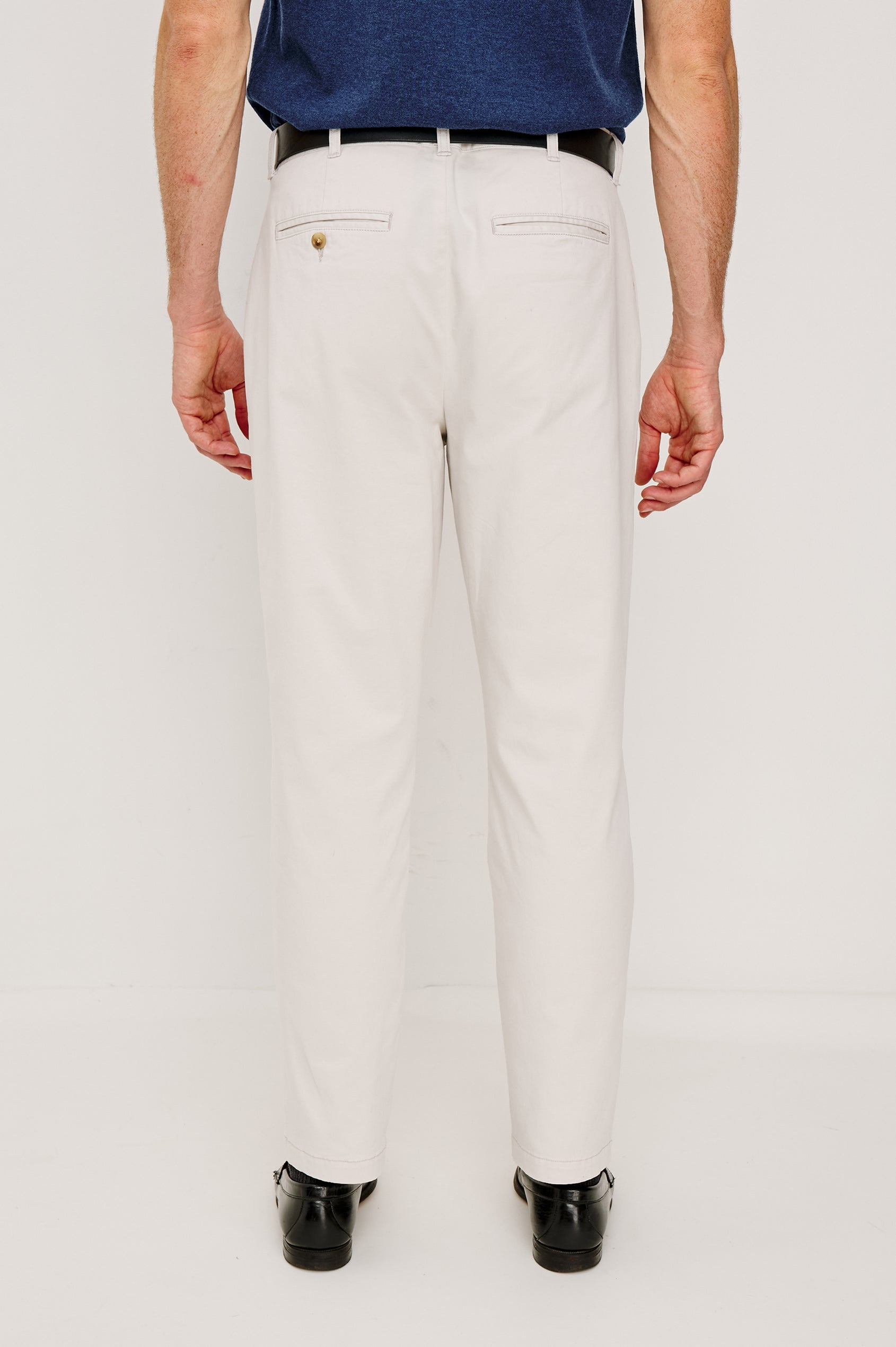 Marcellus Pants with Belt Loops, Two Seam Front Pockets, a Front Buttoned Flap Pocket, a Back Buttoned Welt Pocket and a Back Welt Pocket in Faded Blue Colorway - Lower Body Back View Featured on Model