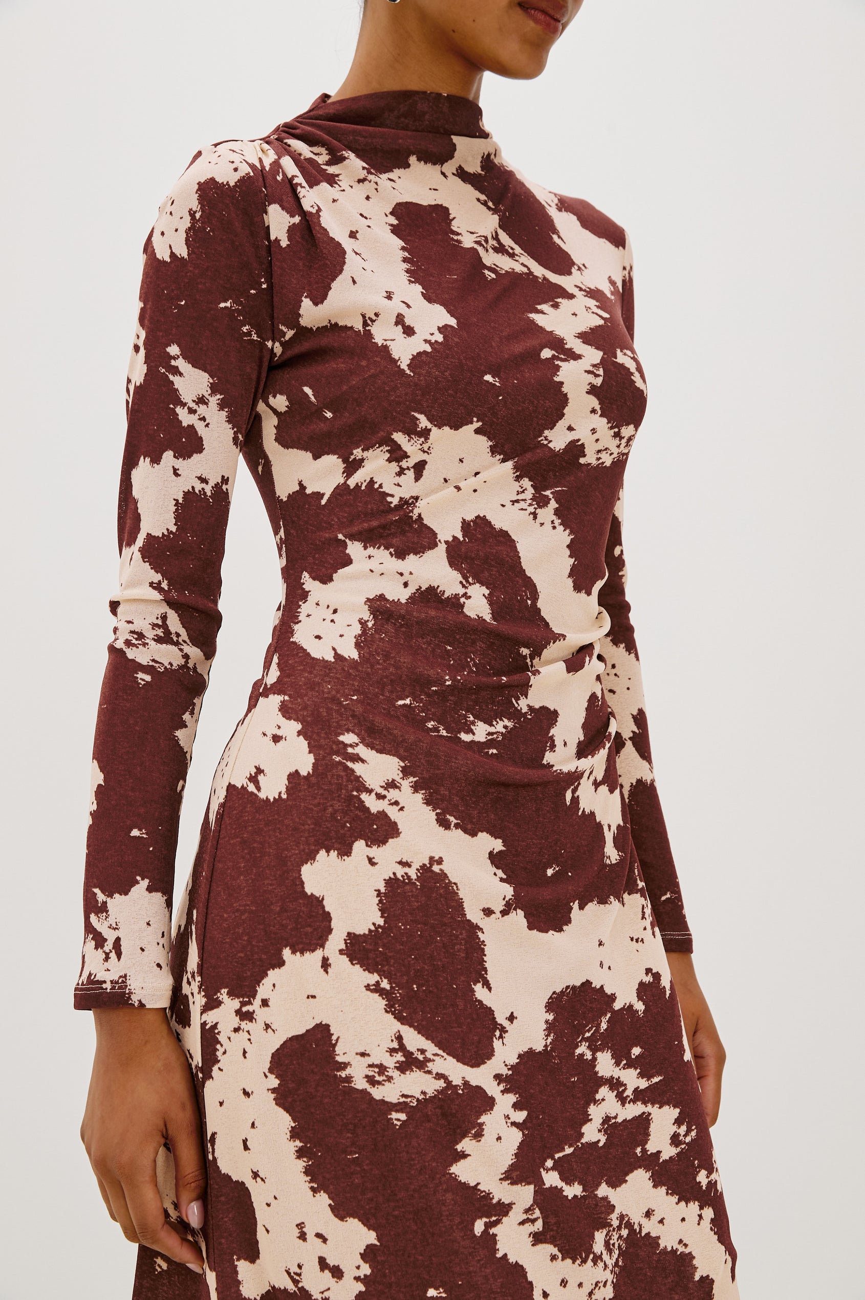 Margaret Long-Sleeve Midi Dress with a Mock Neck and Shirring along the Left Side in Cowgirl Colorway - Close Up View Featured on Model