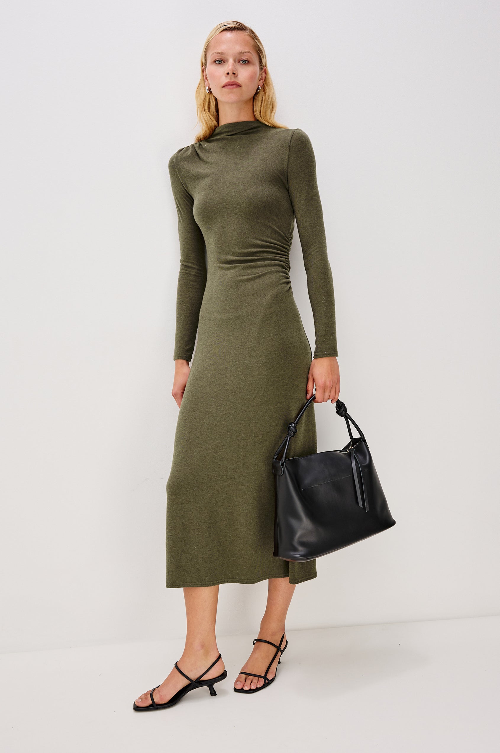 Margaret Long-Sleeve Midi Dress with a Mock Neck and Shirring along the Left Side in Heather Olive Colorway - Stylized Full Body Front View Featured on Model