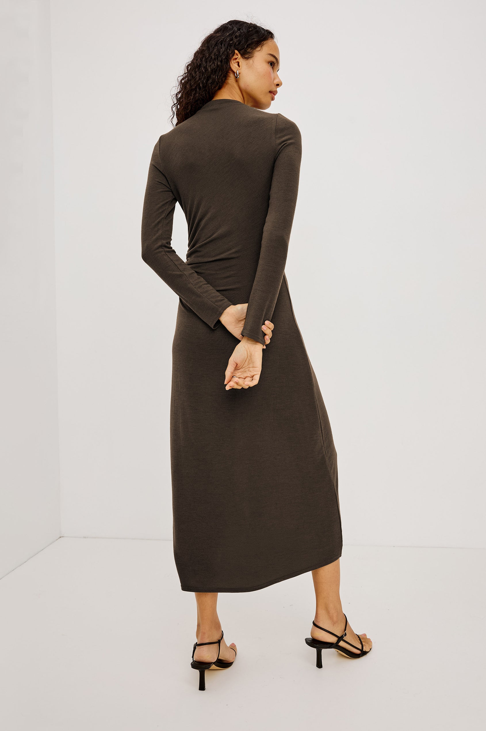 Margaret Midi Dress in Brushed Tissue Jersey With Mock Neck, Long Sleeves, Ruched Sides, and Fitted Silhouette in Heather Olive Colorway - Full Body Back View Featured on Model