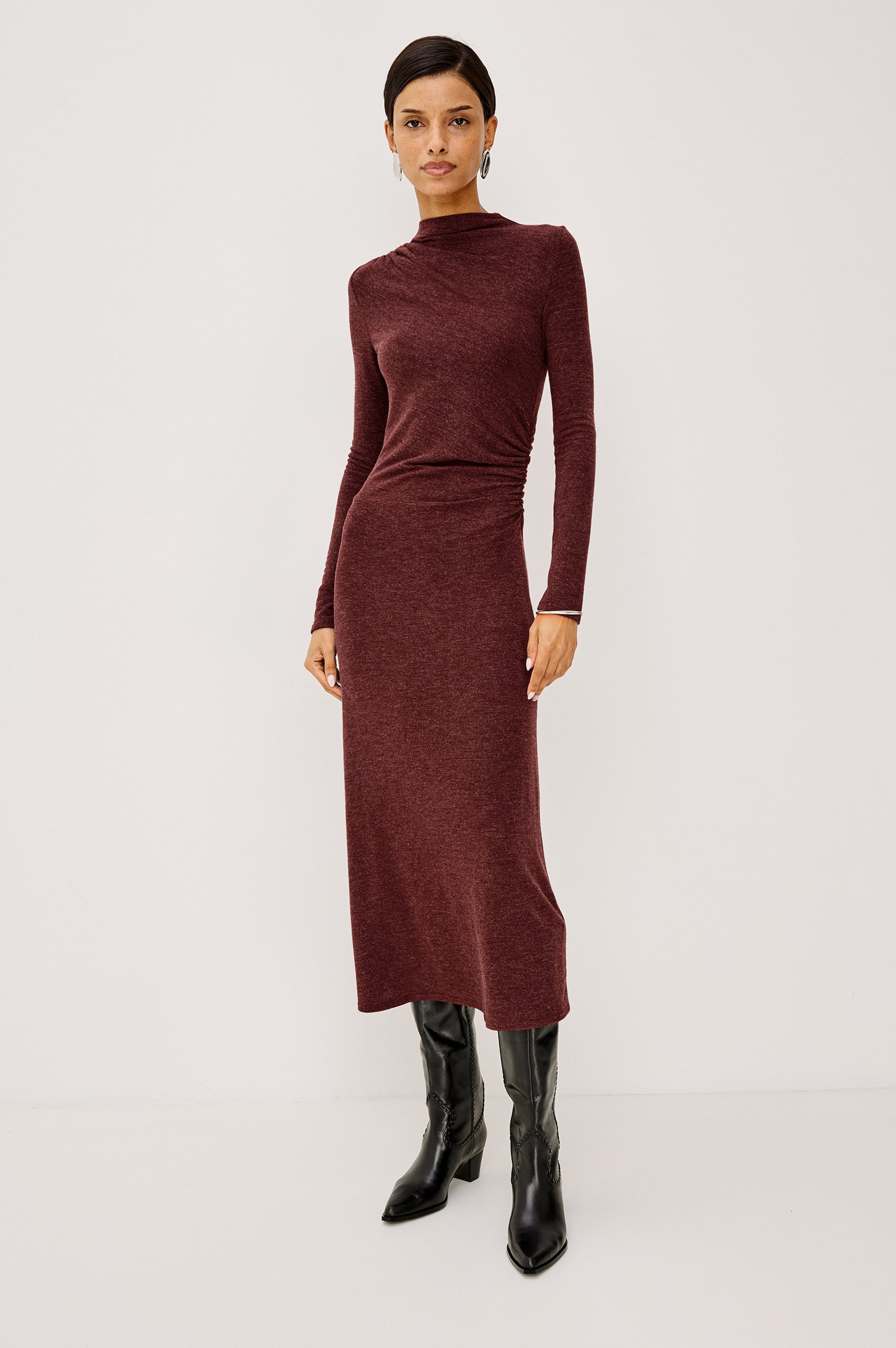Margaret Midi Dress in Brushed Tissue Jersey With Mock Neck, Long Sleeves, Ruched Sides, and Fitted Silhouette in Merlot Colorway - Full Body Front View Featured on Model