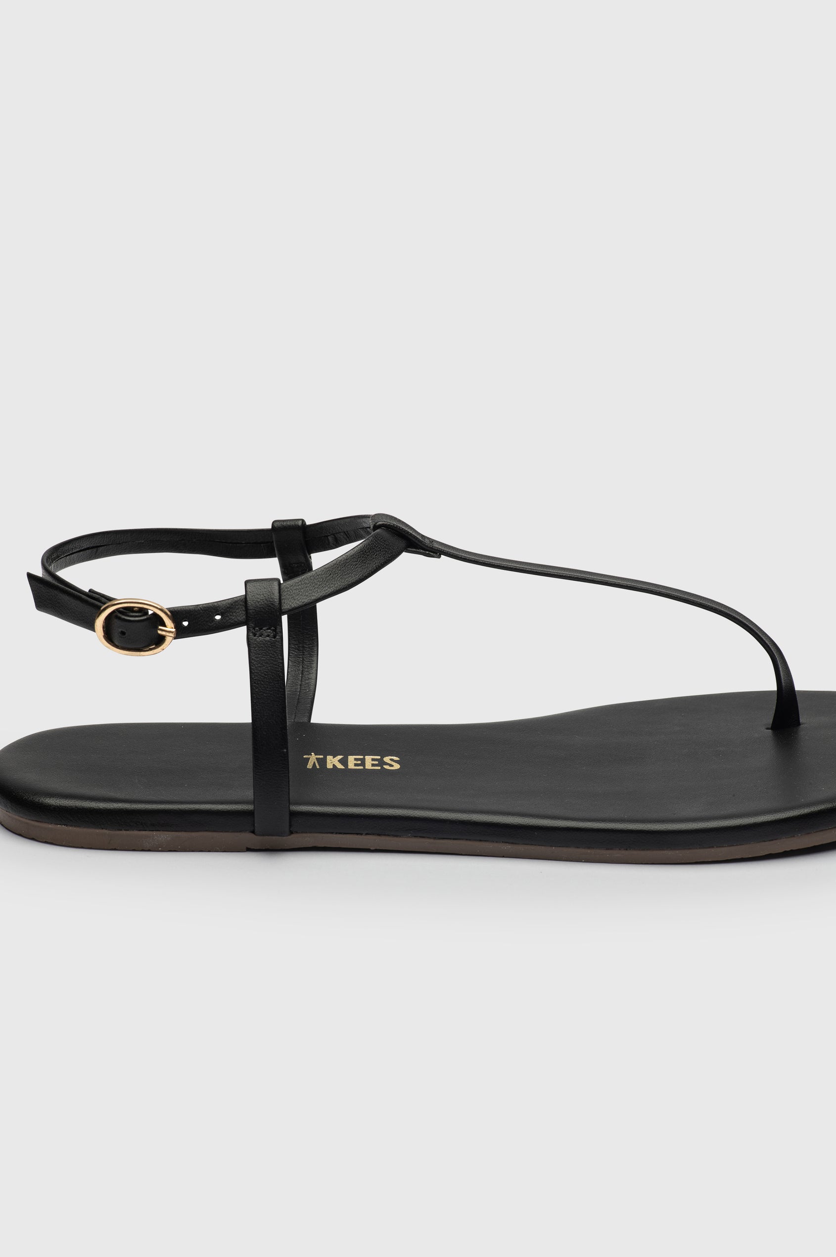 Mariana leather t-strap sandal with ankle strap and buckle in Sable black - close up of heel buckle details