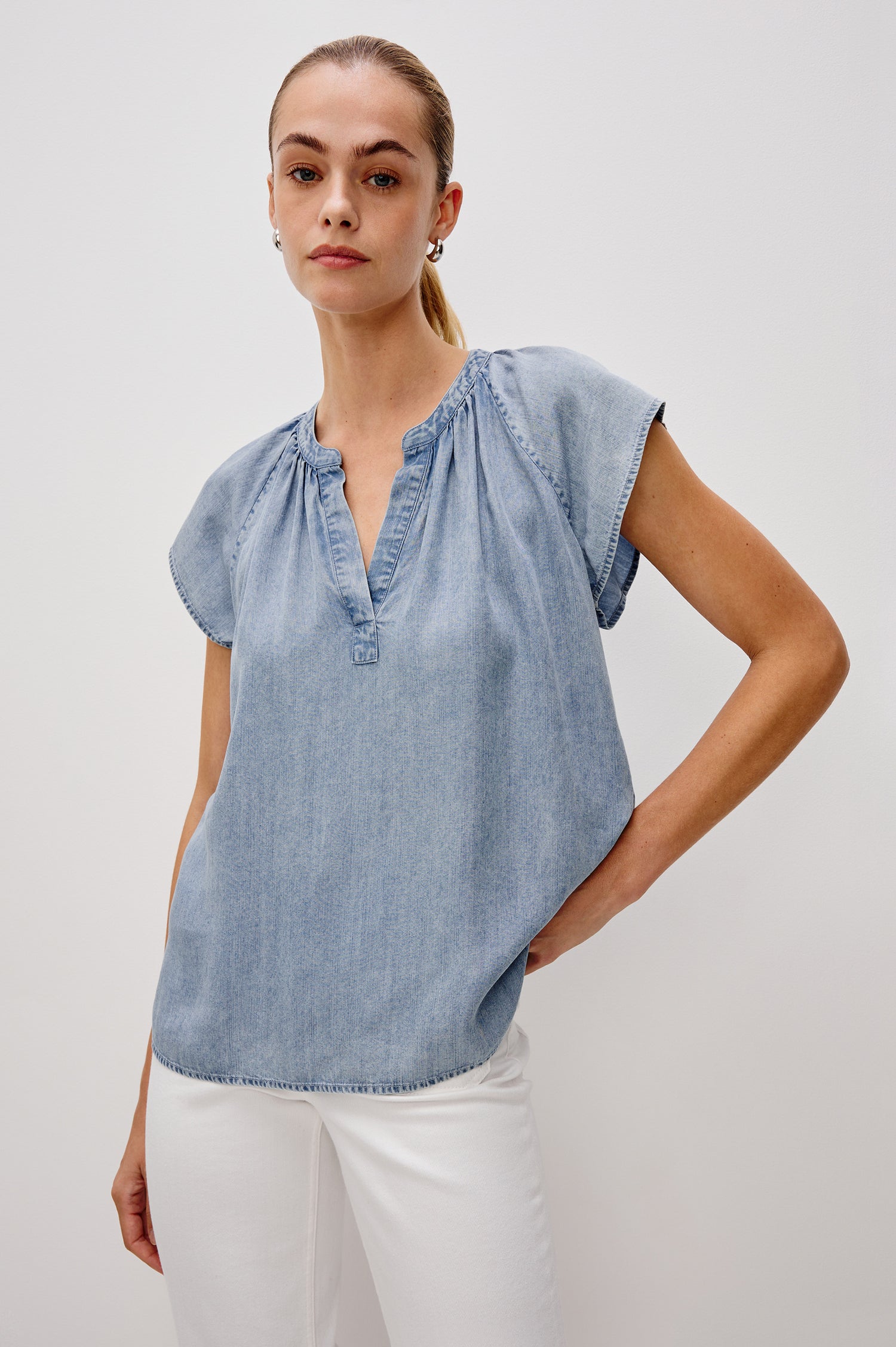 Maribel V-Front Top with Short Raglan Sleeves in Medium Cloud Wash. Front View Shown on Model. 