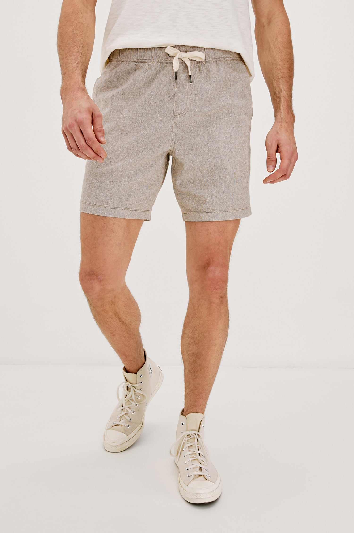 Martin Pull on Short with a an Elastic and Drawstring Waist and Side Pockets in Bulgur Oat Colorway. Front View Shown on Model.