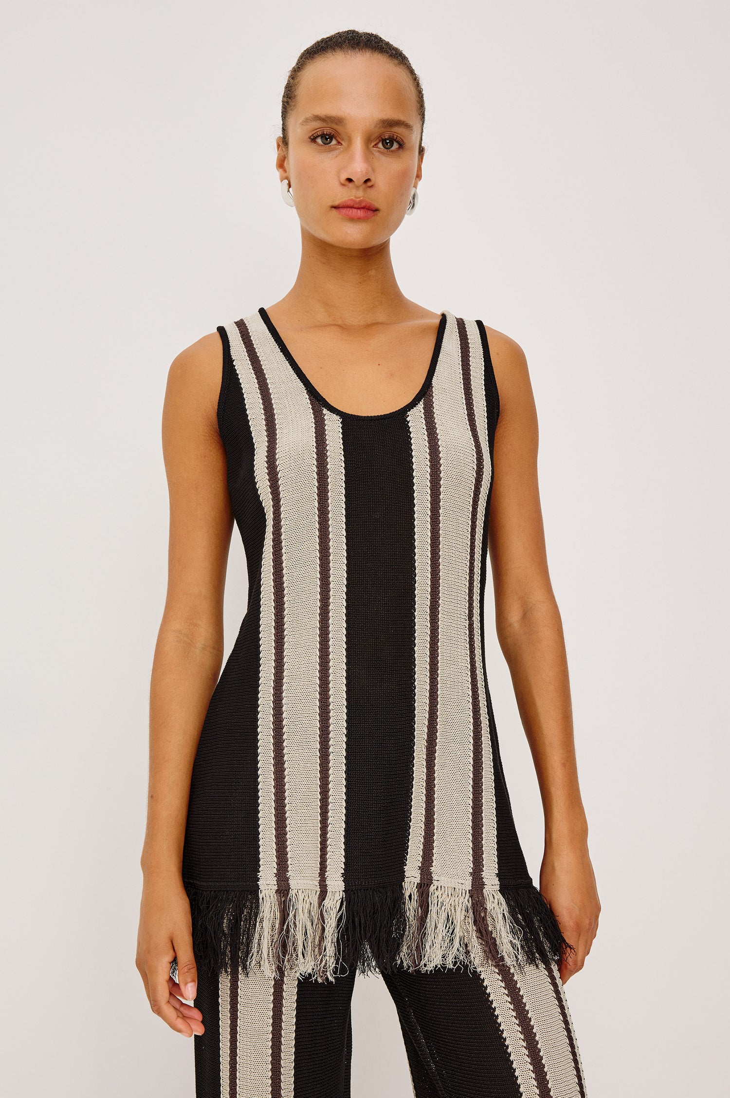 Martina Top in Knit With Scoop Neckline, Relaxed Fit, Tunic Length, and Fringe Hem in Espresso Stripe Colorway - Upper Body Front View Featured on Model
