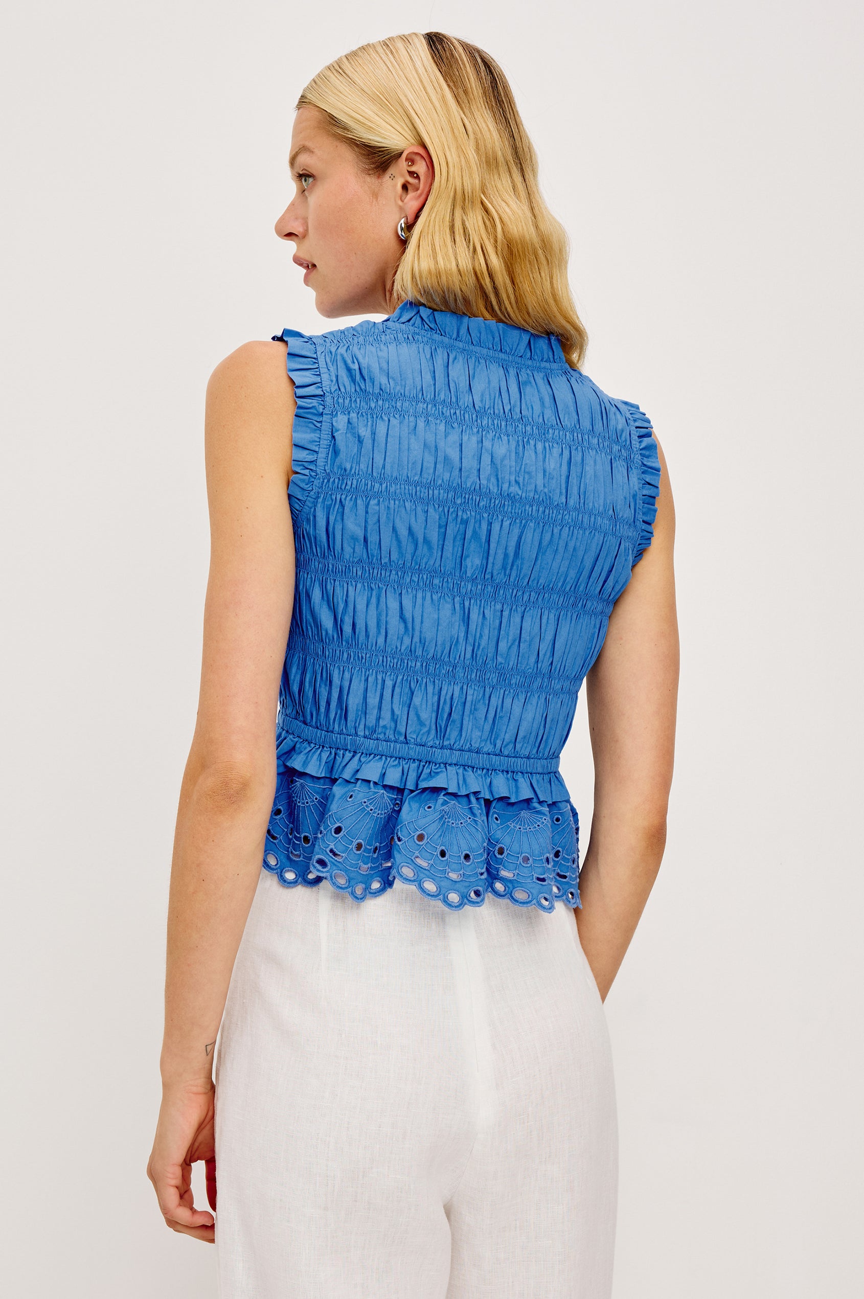 Martine Cropped Sleeveless Top in Heavy Cotton Poplin With Plunging V-Neckline With Adjustable Ties and Ruffle Trim in Harbor Blue Colorway - Upper Body Back View Featured on Model