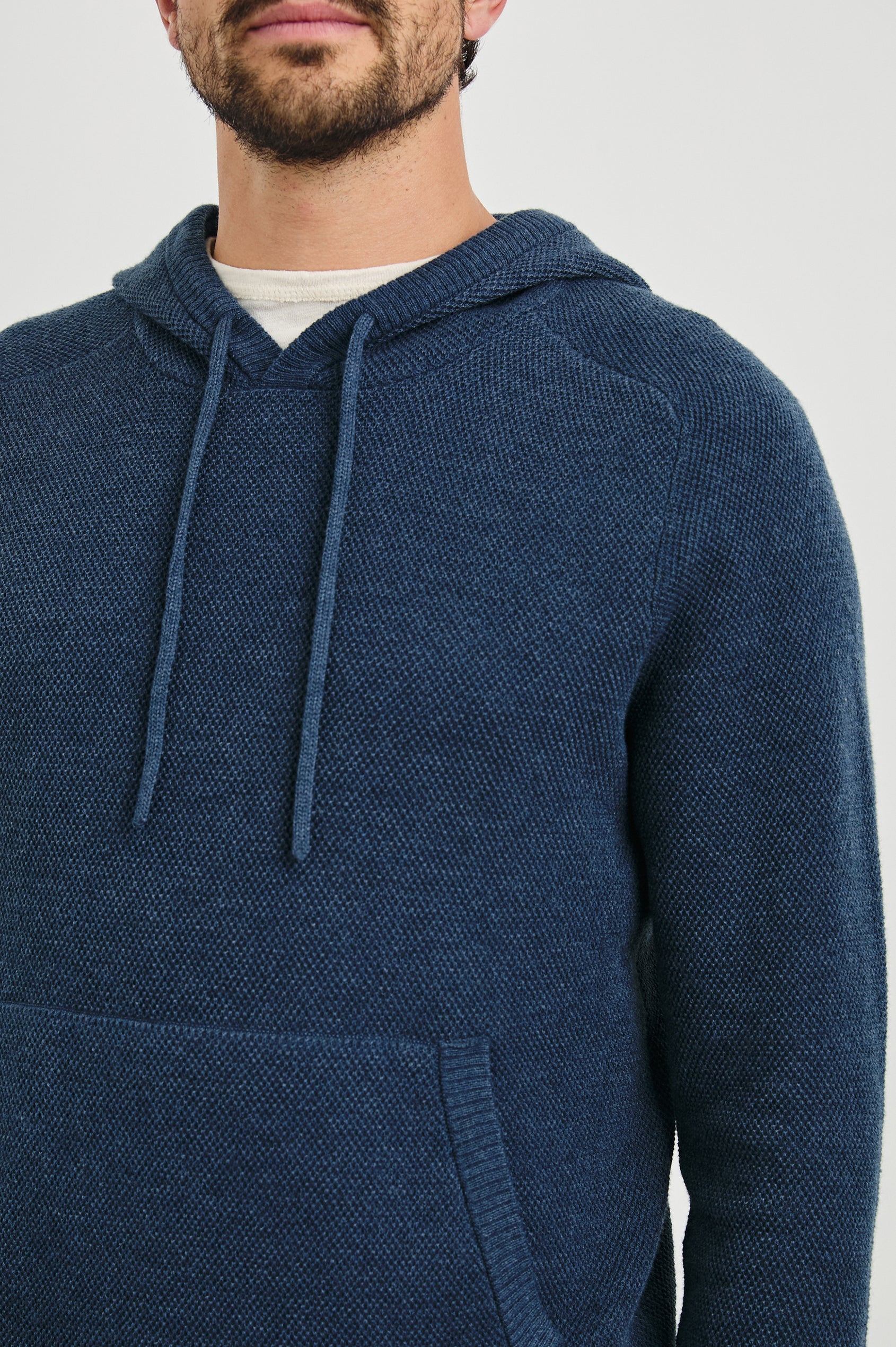 Matador Hoodie with Drawstring ties and a Kangaroo Pocket in Blue Melange Colorway - Front View Featured on Model