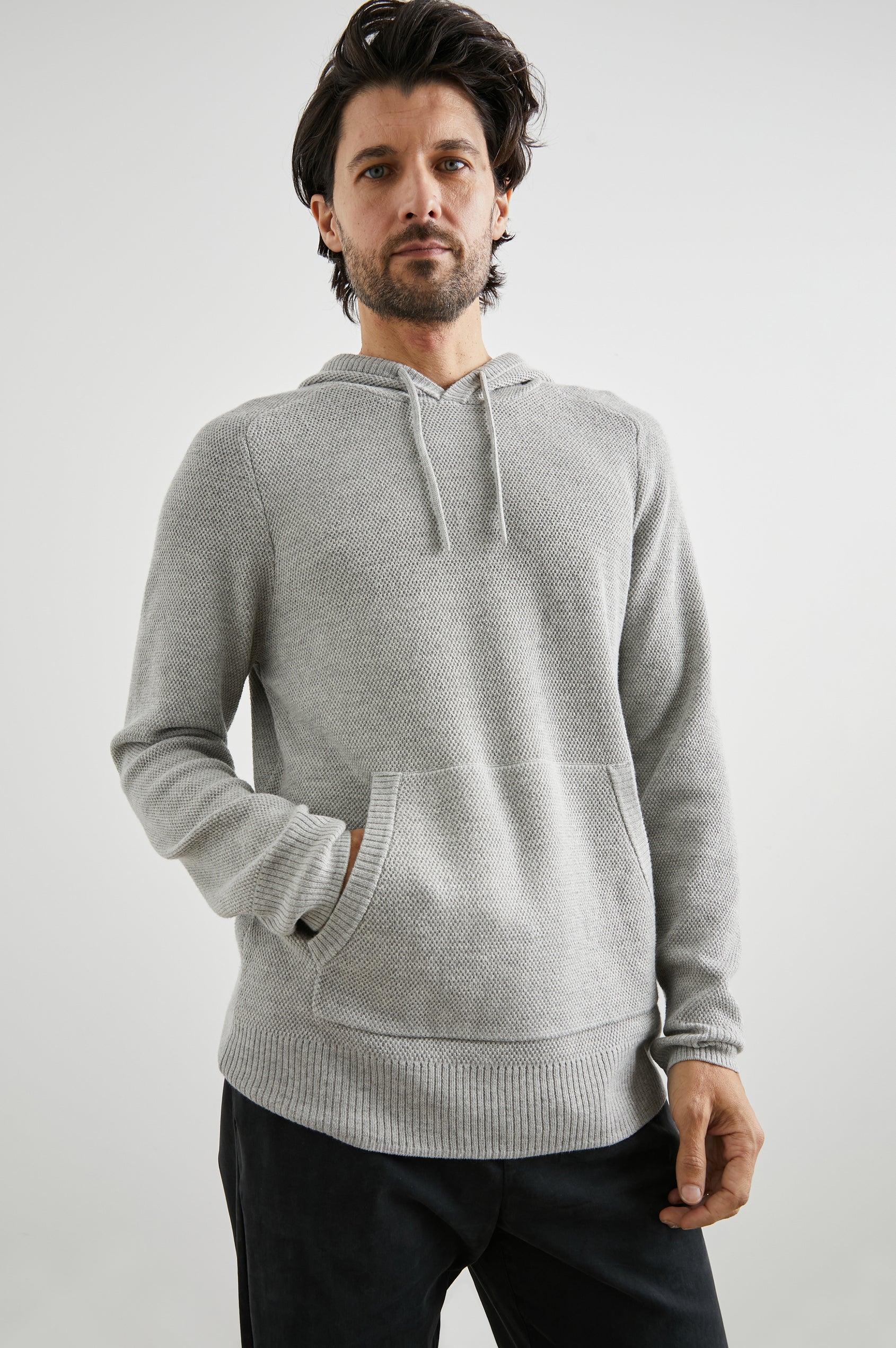 Matador Hoodie with Drawstring ties and a Kangaroo Pocket in Grey Heather Colorway - Front View Featured on Model
