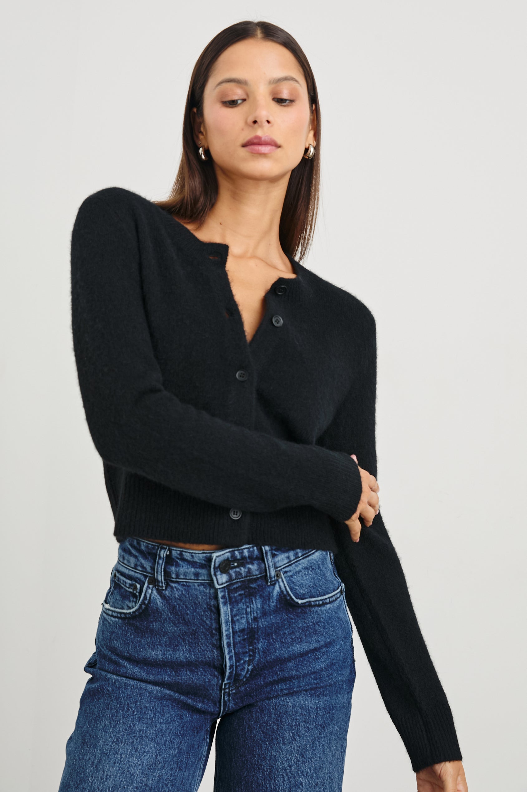 Matilda Cropped Long-Sleeve Sweater with Button Closure, Crew Neck and Ribbed Trim in Black Colorway - Front View Featured on Model