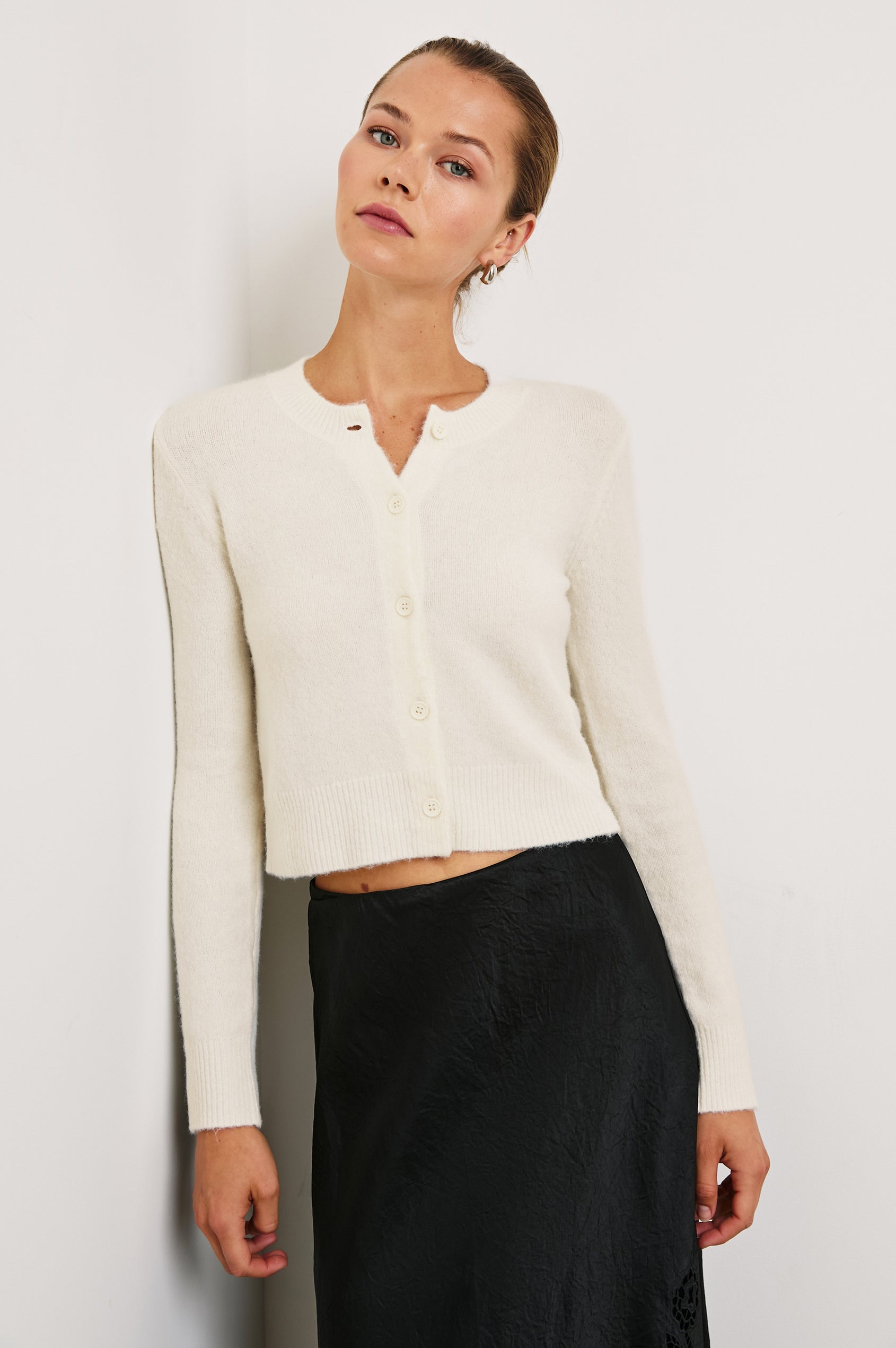 Matilda Cropped Long-Sleeve Sweater with Button Closure, Crew Neck and Ribbed Trim in Ivory Colorway - Front View Featured on Model