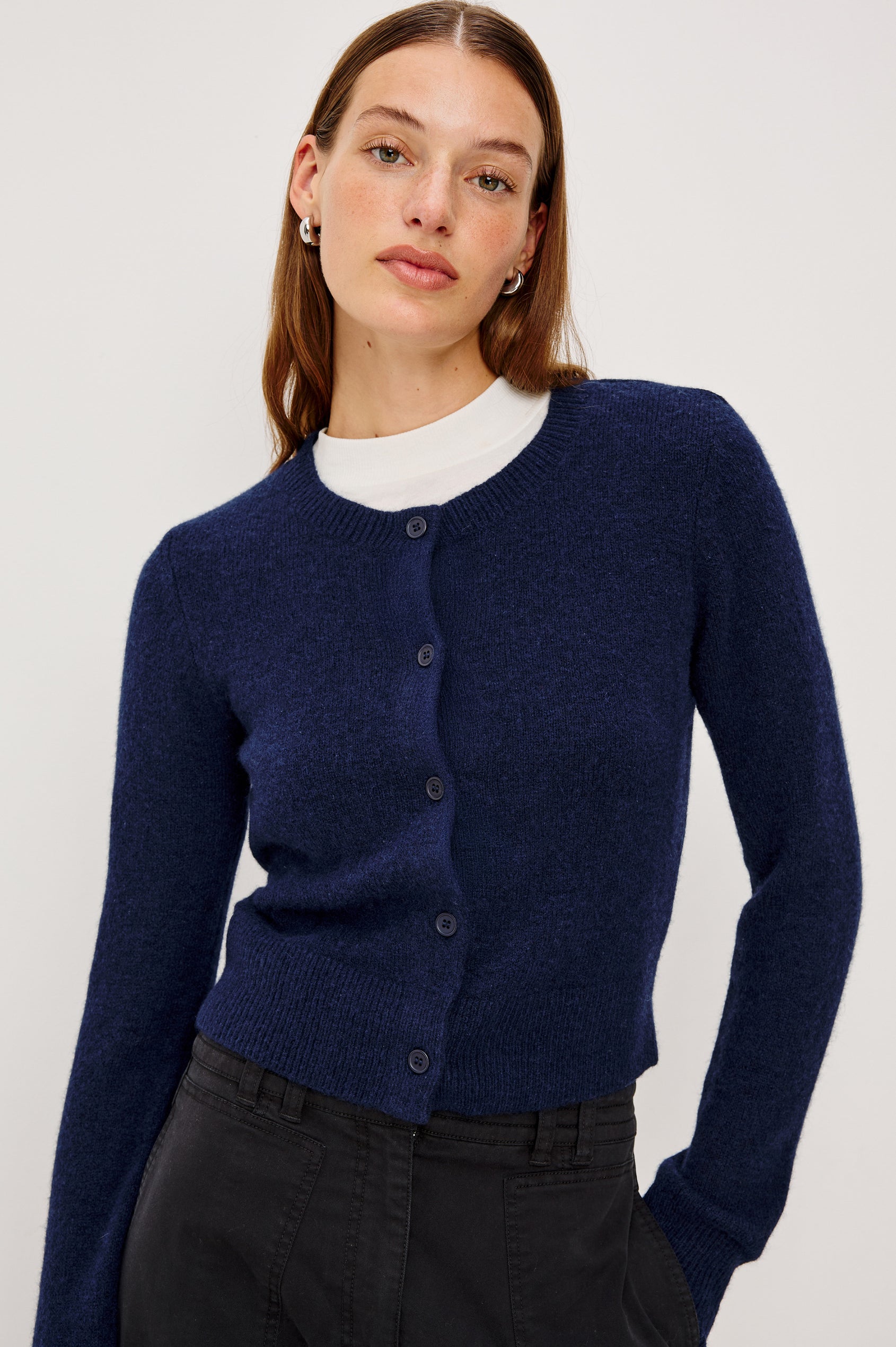 Matilda Cropped Long-Sleeve Sweater with Button Closure, Crew Neck and Ribbed Trim in Navy Colorway - Front View Featured on Model