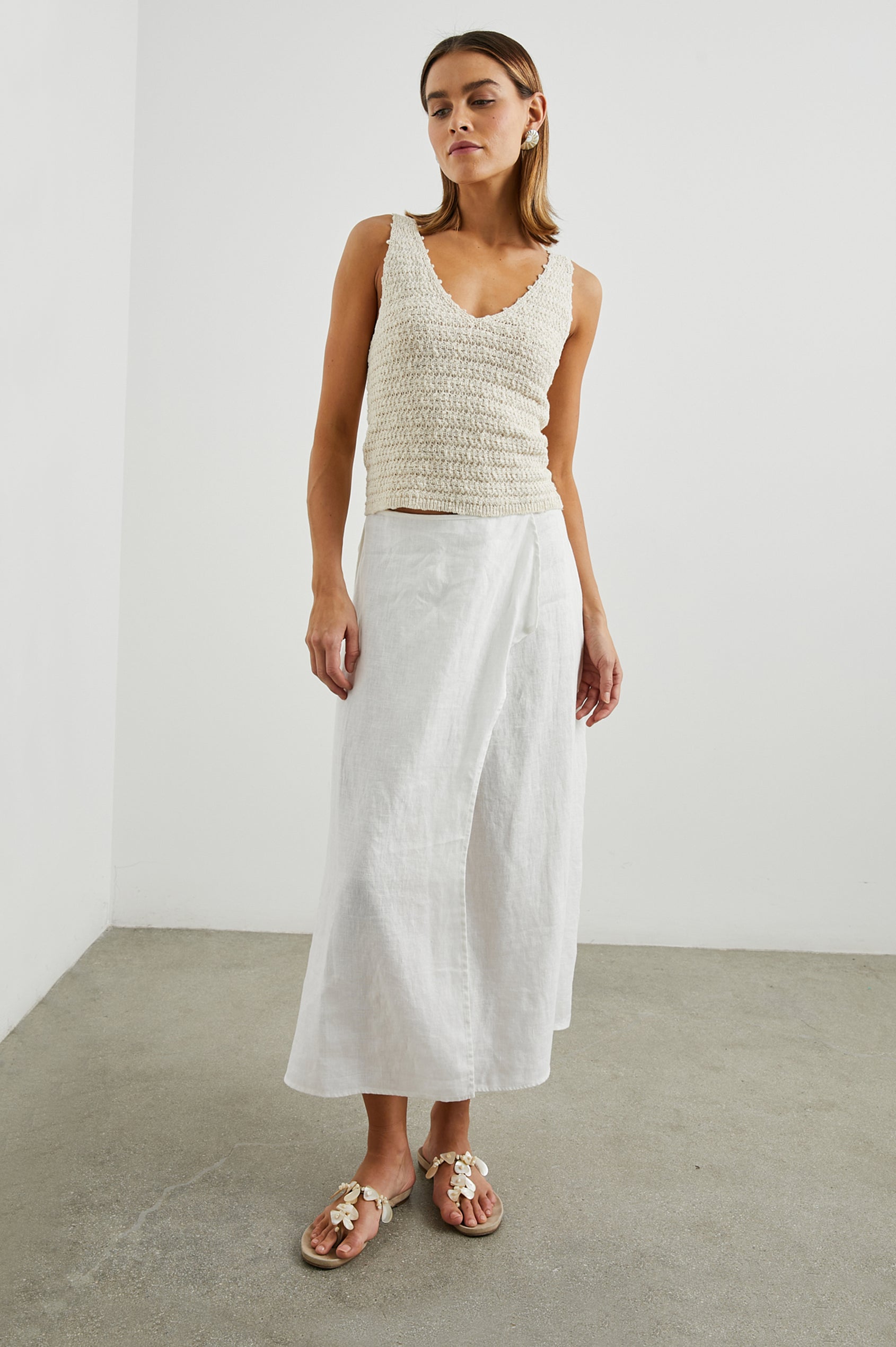 Matilde Crop Knit Tank with a V Neck in Oat Colorway - Front Full Body View Featured on Model  