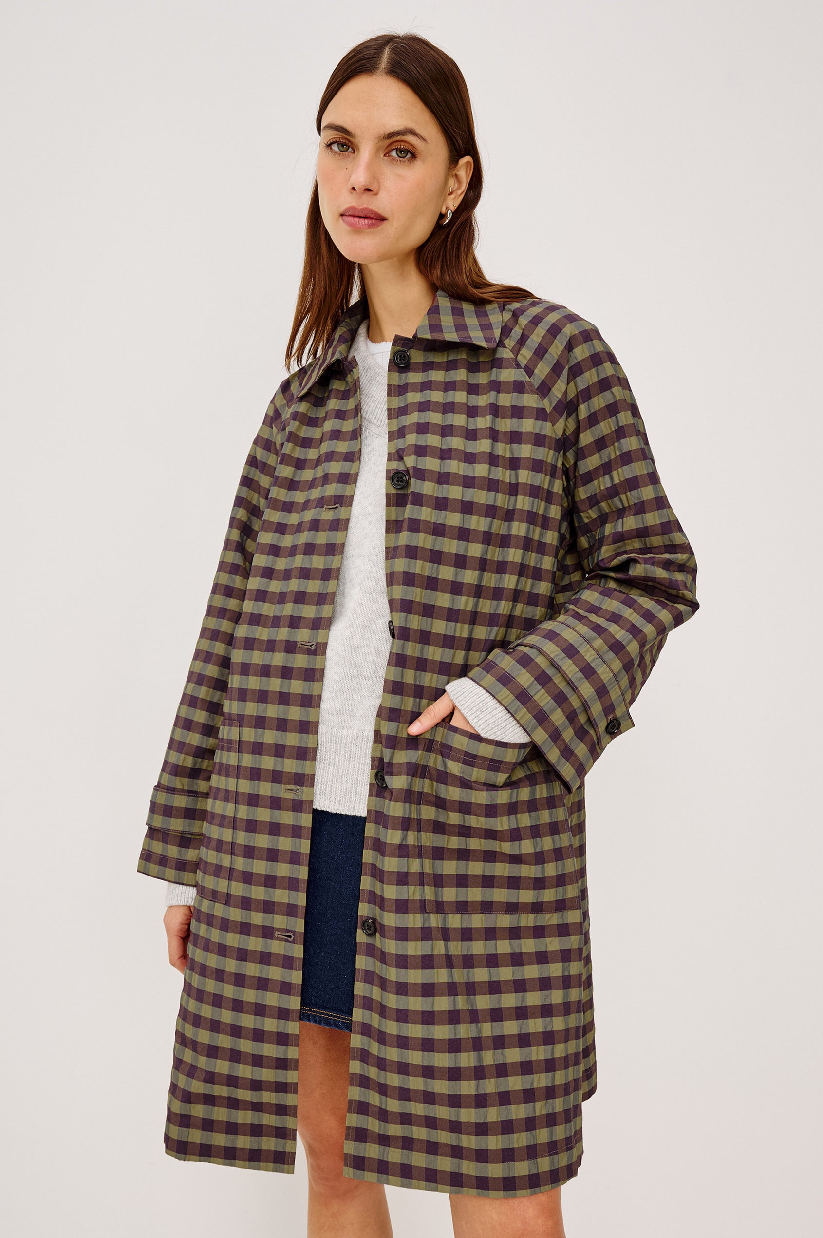 Mattie Trench Jacket in Lightweight Crinkle Nylon With Slightly Oversized Fit, Point Collar, Front Buttons, Front Patch Pockets, and Side Slits in Tapenade Check Colorway - Upper Body Front View Featured on Model