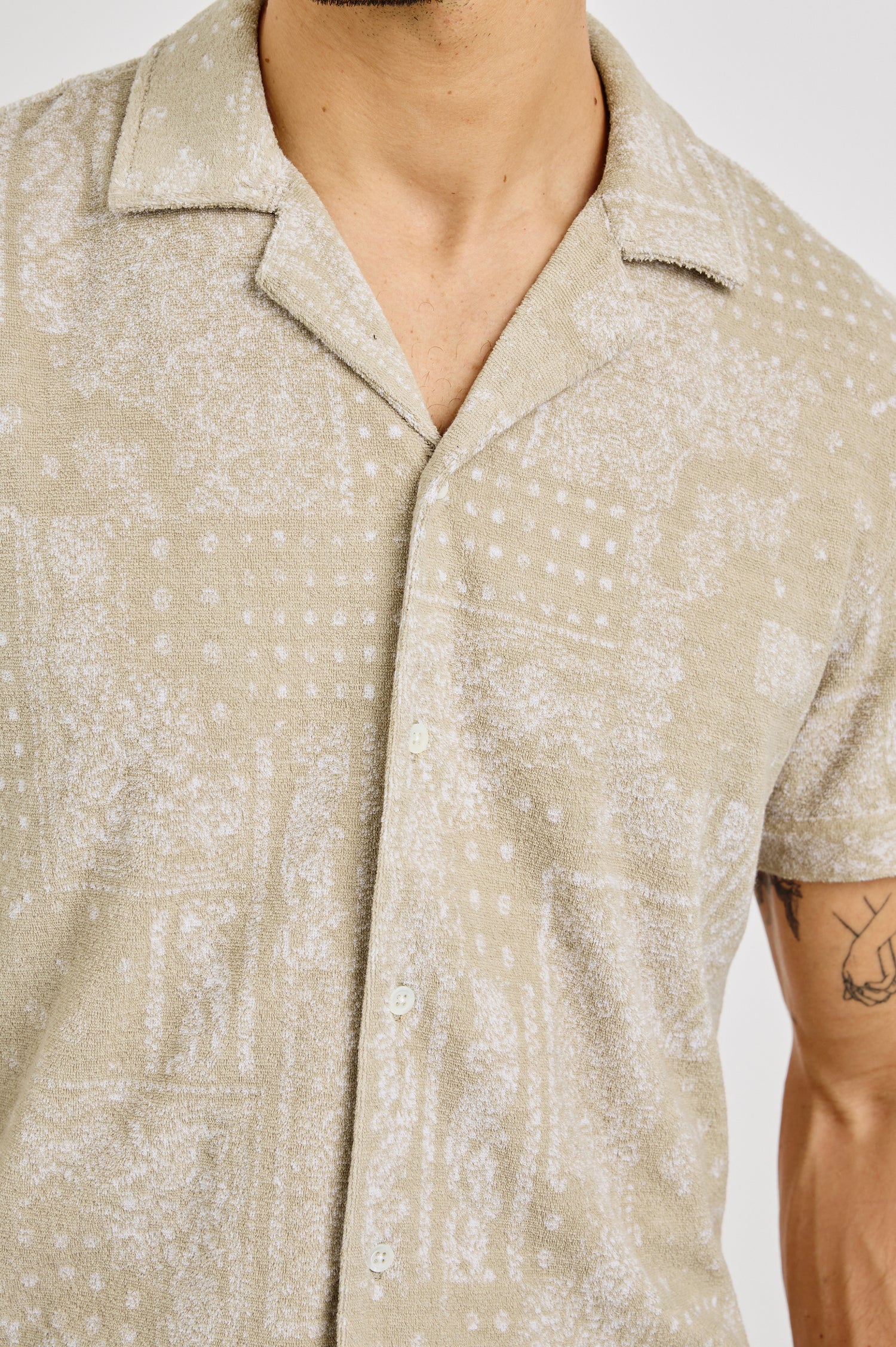 Maverick Collared Button Front Shirt with Short Sleeves in Bandana Craft Paper Colorway. Front Detailed View Shown on Model.