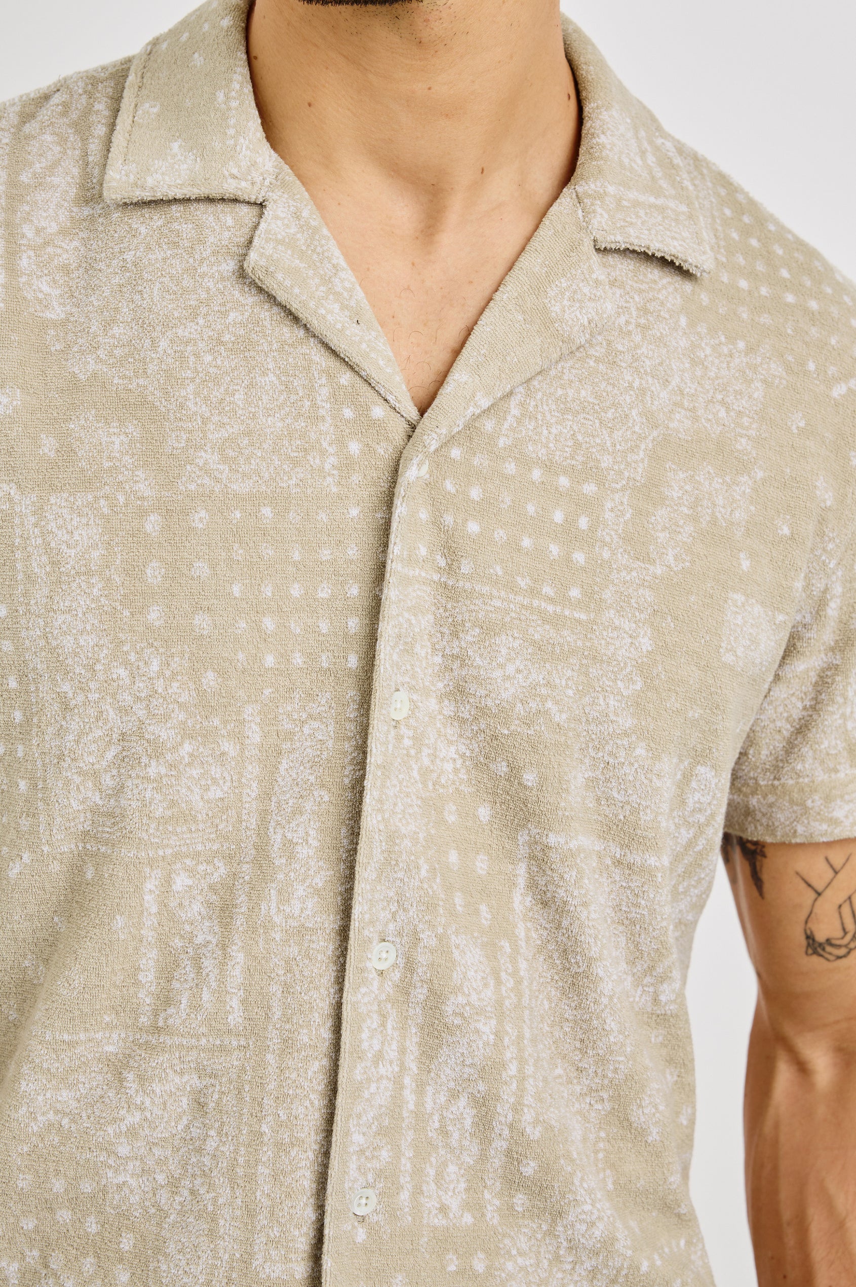 Maverick Collared Button Front Shirt with Short Sleeves in Bandana Craft Paper Colorway. Front Detailed View Shown on Model.