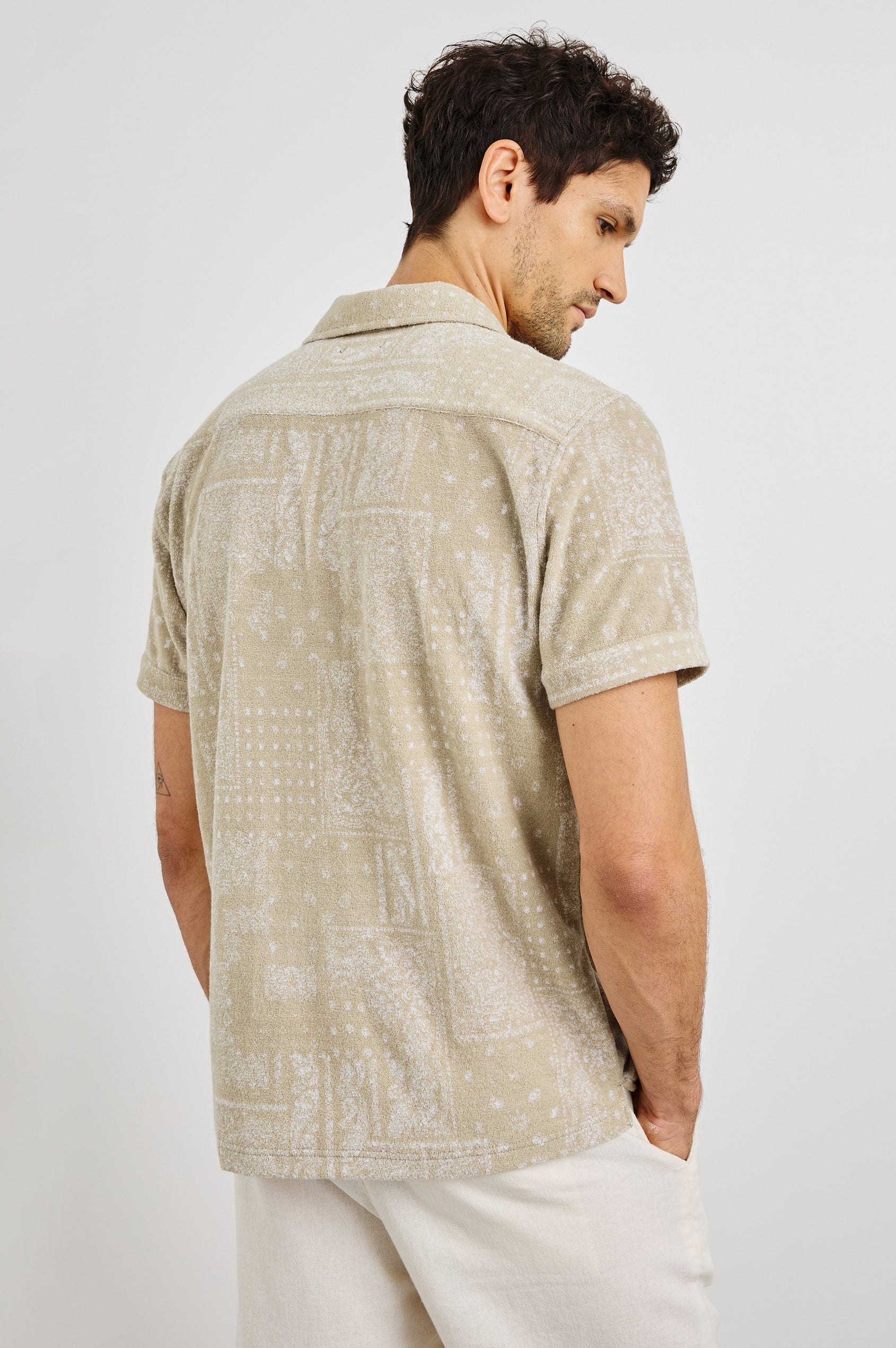 Maverick Collared Button Front Shirt with Short Sleeves in Bandana Craft Paper Colorway. Back View Shown on Model.
