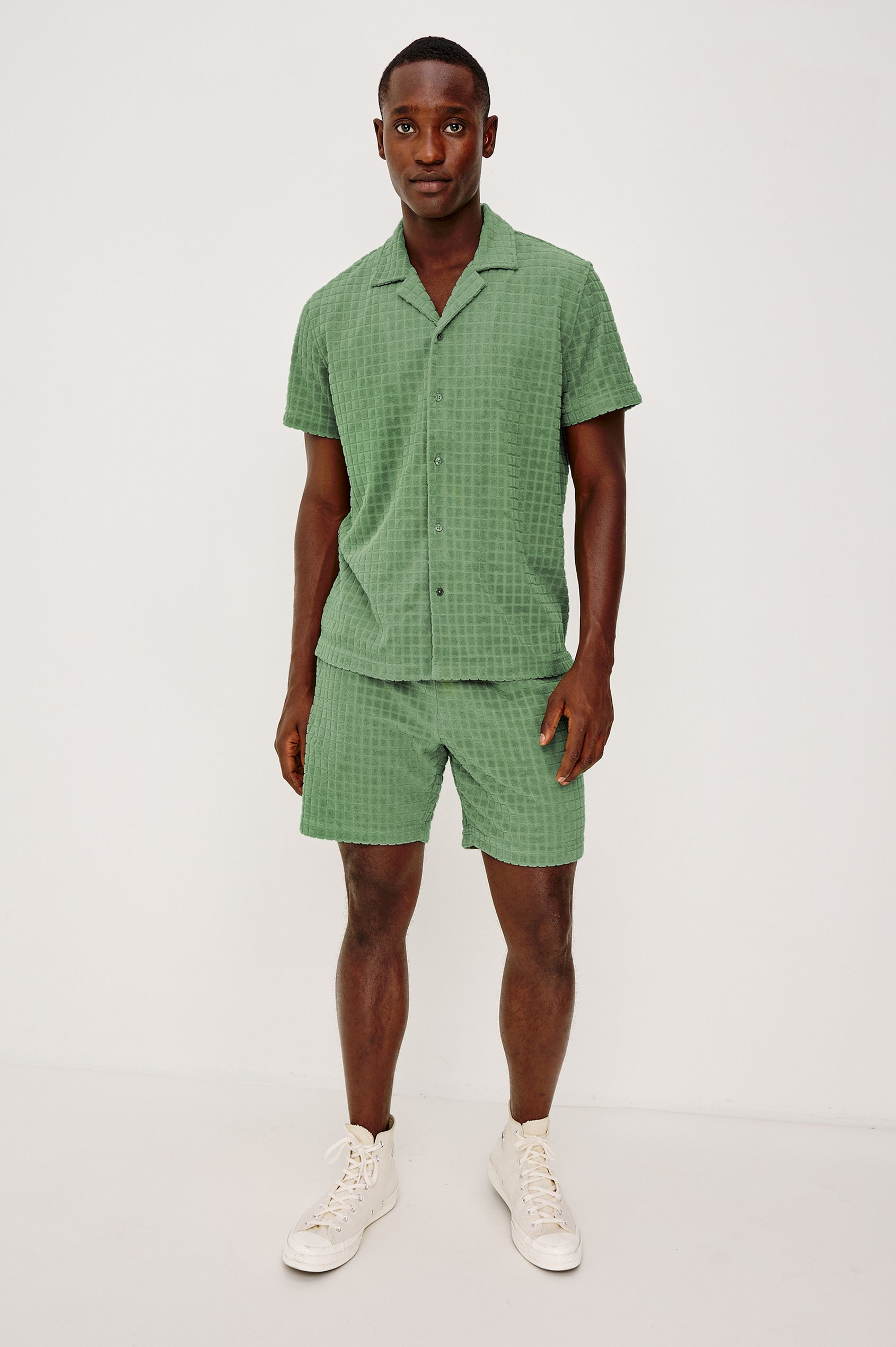 Maverick Short Sleeve Shirt in French Terry With Jacquard Pattern, Notched Collar, Front Buttons, and Classic Fit in Green Bay Grid Colorway - Full Body Front View Featured on Model