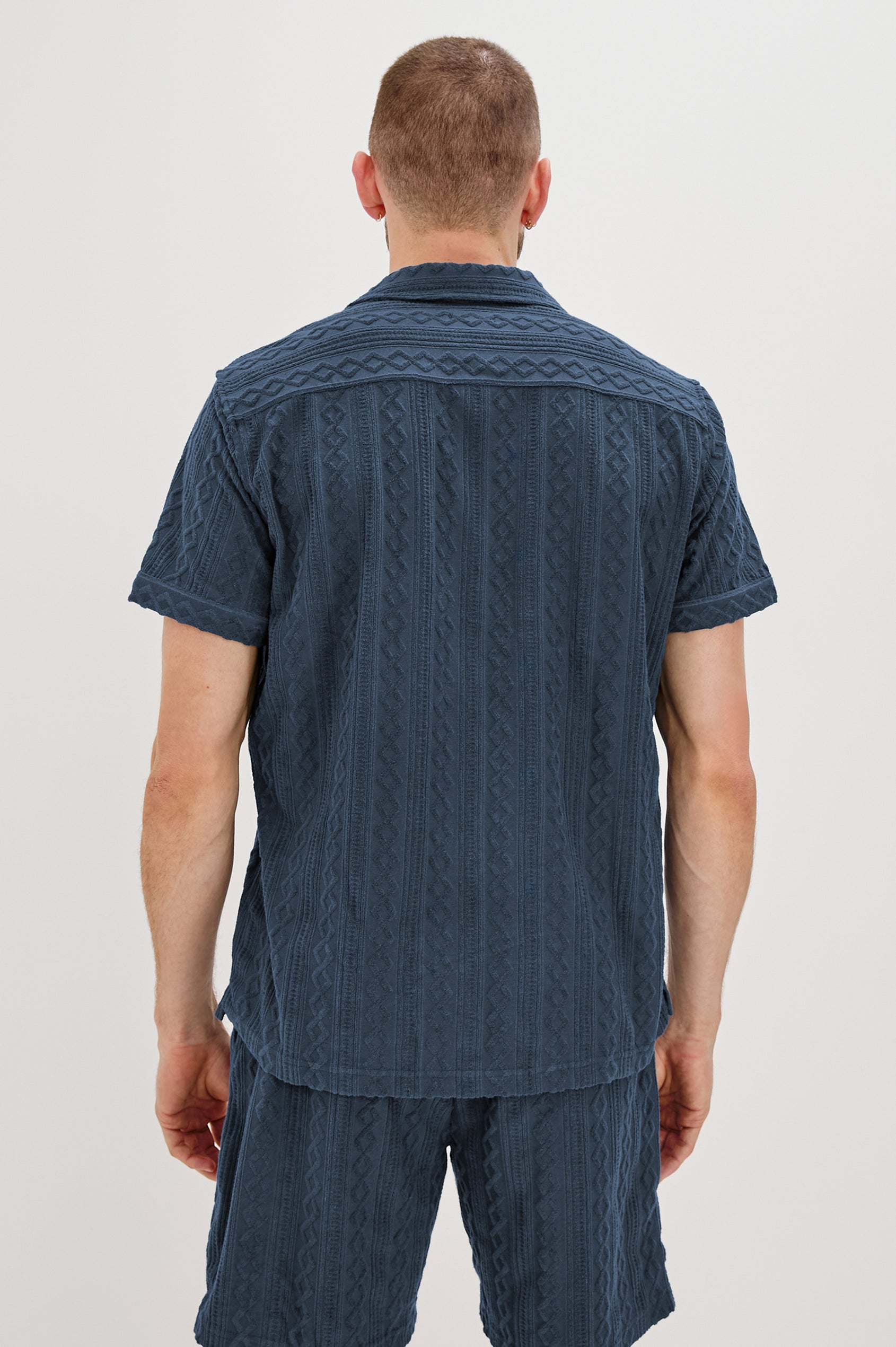 Maverick Collared Button Front Shirt with Short Sleeves in Royal Blue Colorway. Back View Shown on Model.