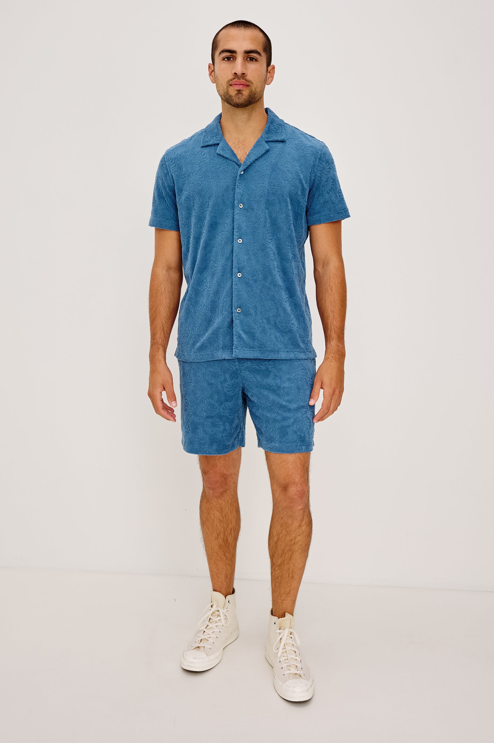Maverick Short Sleeve Shirt in French Terry With Jacquard Pattern, Notched Collar, Front Buttons, and Classic Fit in Royal Palm Colorway - Full Body Front View Featured on Model