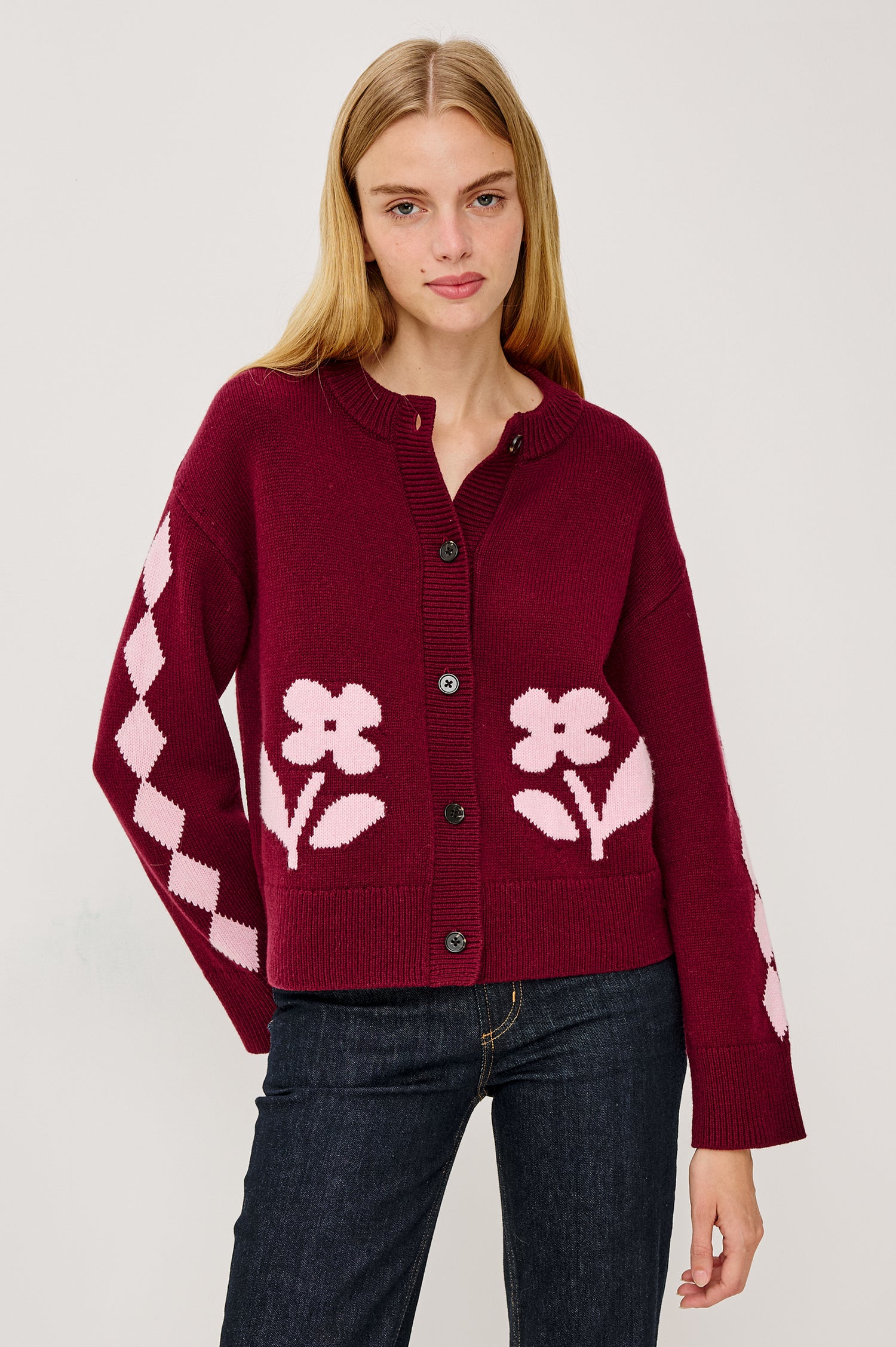 Mavie Long-Sleeve Cardigan with Button Closure, Crew Neck and Ribbed Trim in Garnet Daisy Colorway with Pink Flowers and Diamonds on Garnet - Front View Featured on Model
