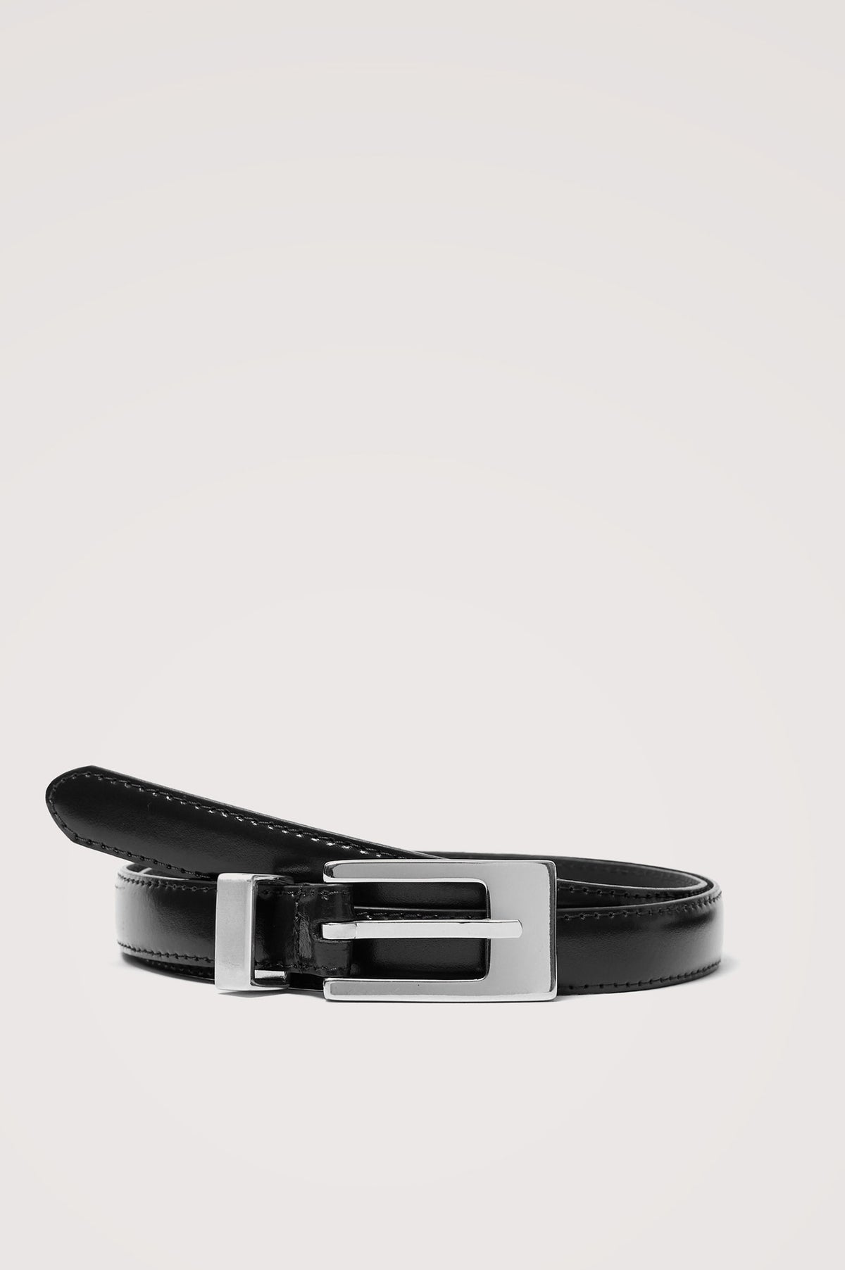 Mayfair Belt in Italian Leather with a Clean Rectangular Buckle in Black Silver Colorway - Upper Body Front View Featured on Model.