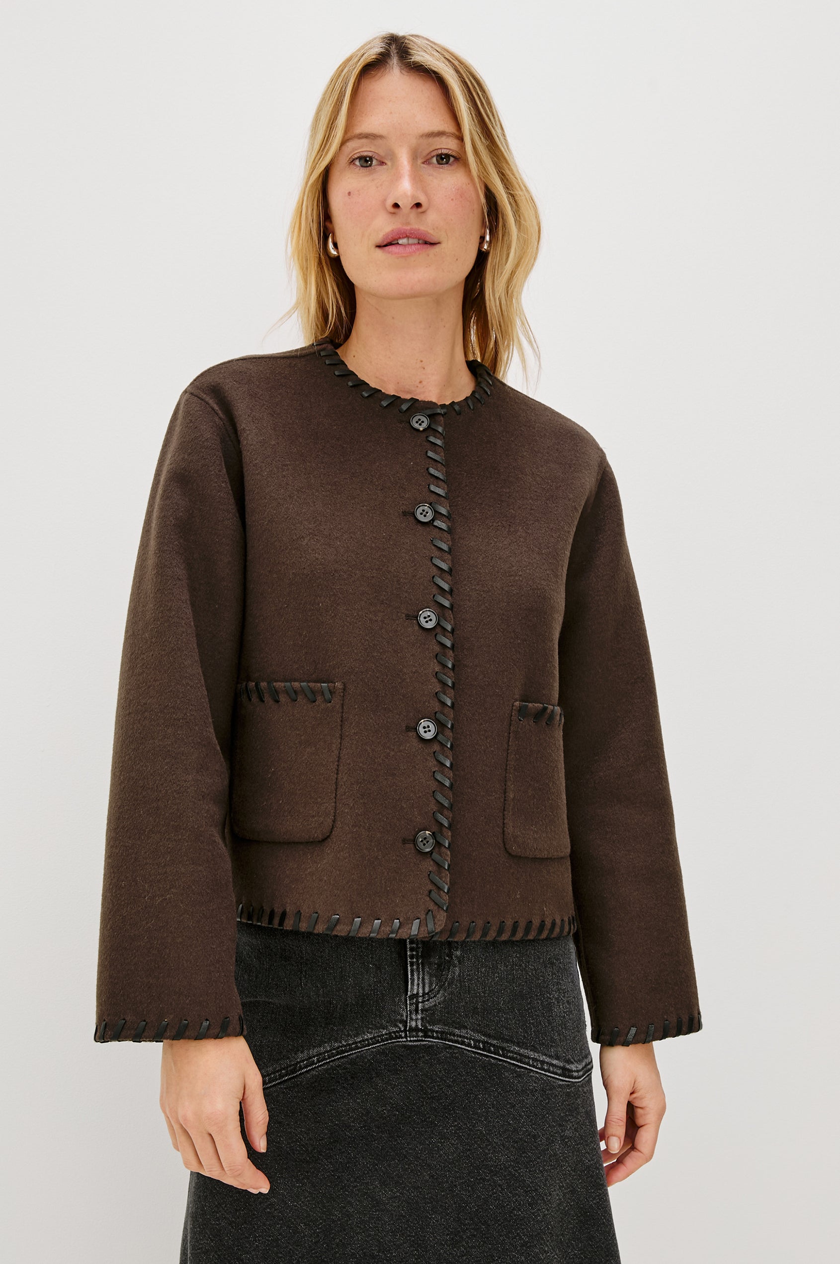 Melanie Jacket with Button Closure and Two Front Patch Pockets in Dark Brown Colorway, with Leather Whipstitching along the Trim and Pockets - Front View Featured on Model
