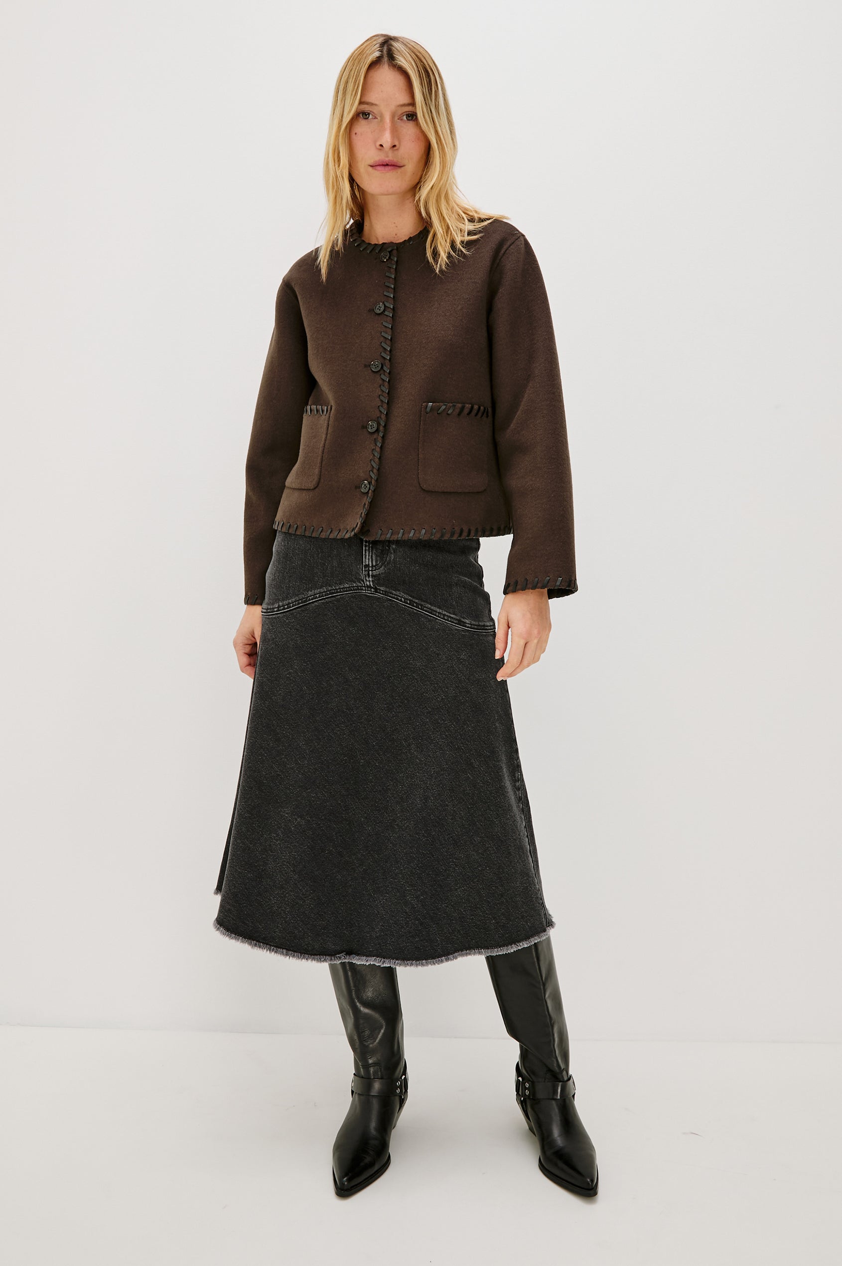 Melanie Jacket with Button Closure and Two Front Patch Pockets in Dark Brown Colorway, with Leather Whipstitching along the Trim and Pockets - Full Body Front View Featured on Model