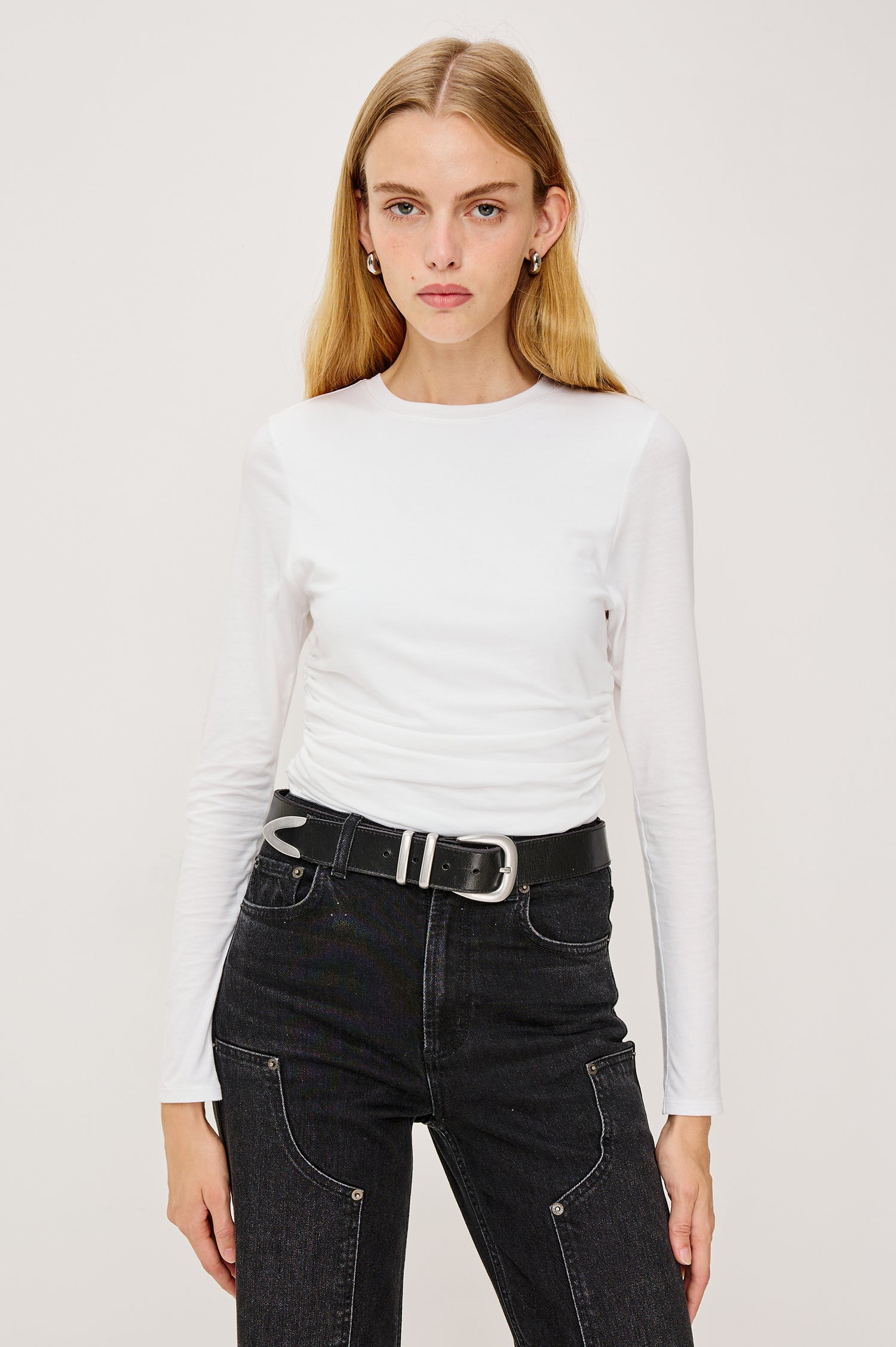 Melle Fitted Top in Organic Cotton With Crew Neckline, Side Shirring, and Long Sleeves in White Colorway - Upper Body Front View Featured on Model