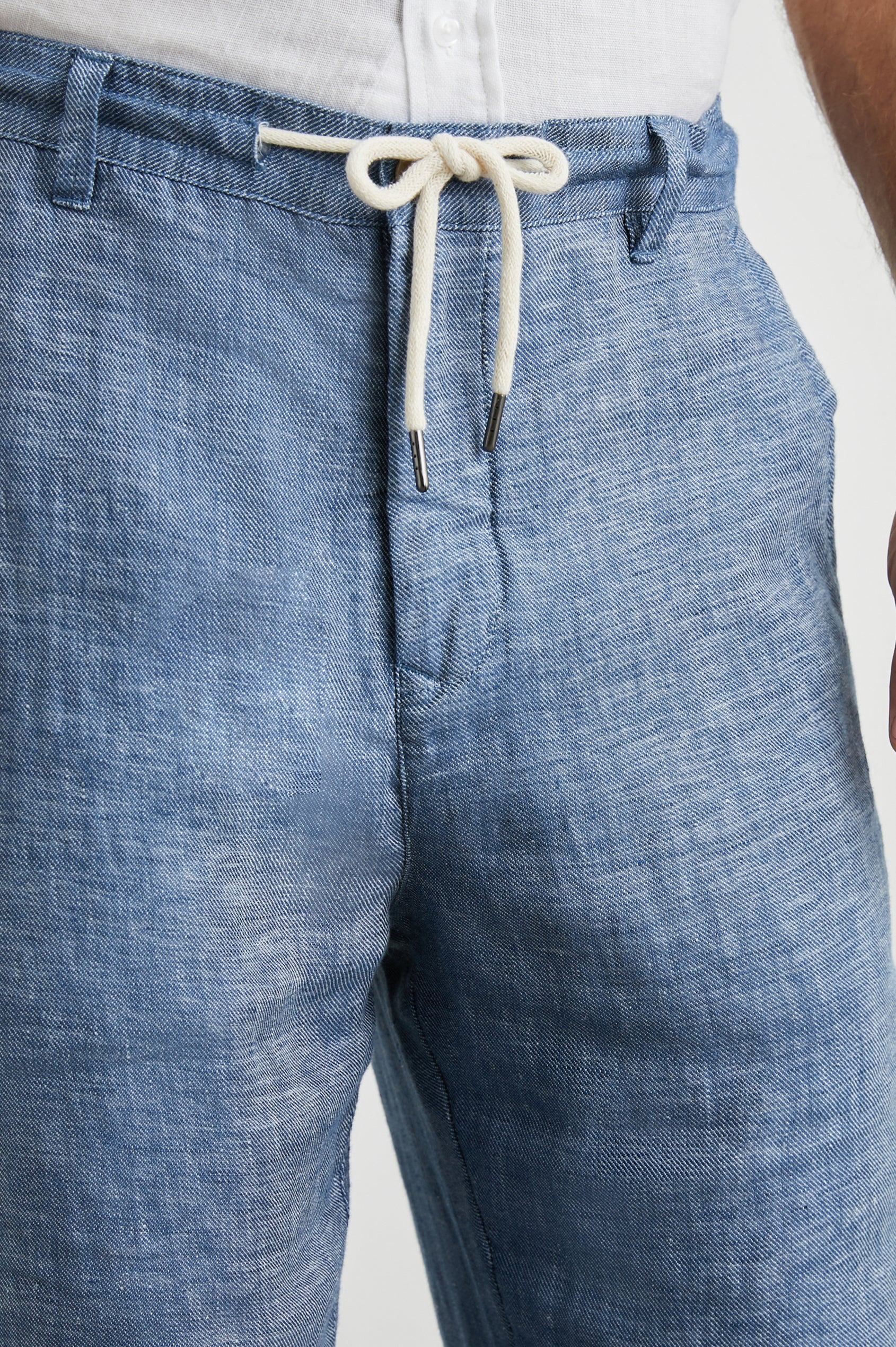 Mercer Pants with a Button and Drawcord Waist, Belt Loops, Two Front Pockets and Two Back Button Welt Pockets in Blue Mirage Colorway - Front View Featured on Model